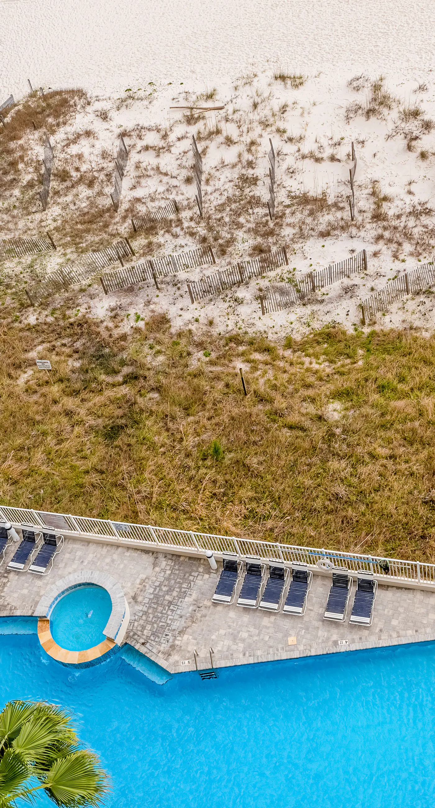 Bold & Bright Beachfront Condo with Resort Style  Pools, Sauna, Fitness Room, Private Balcony featuring amazing Views!