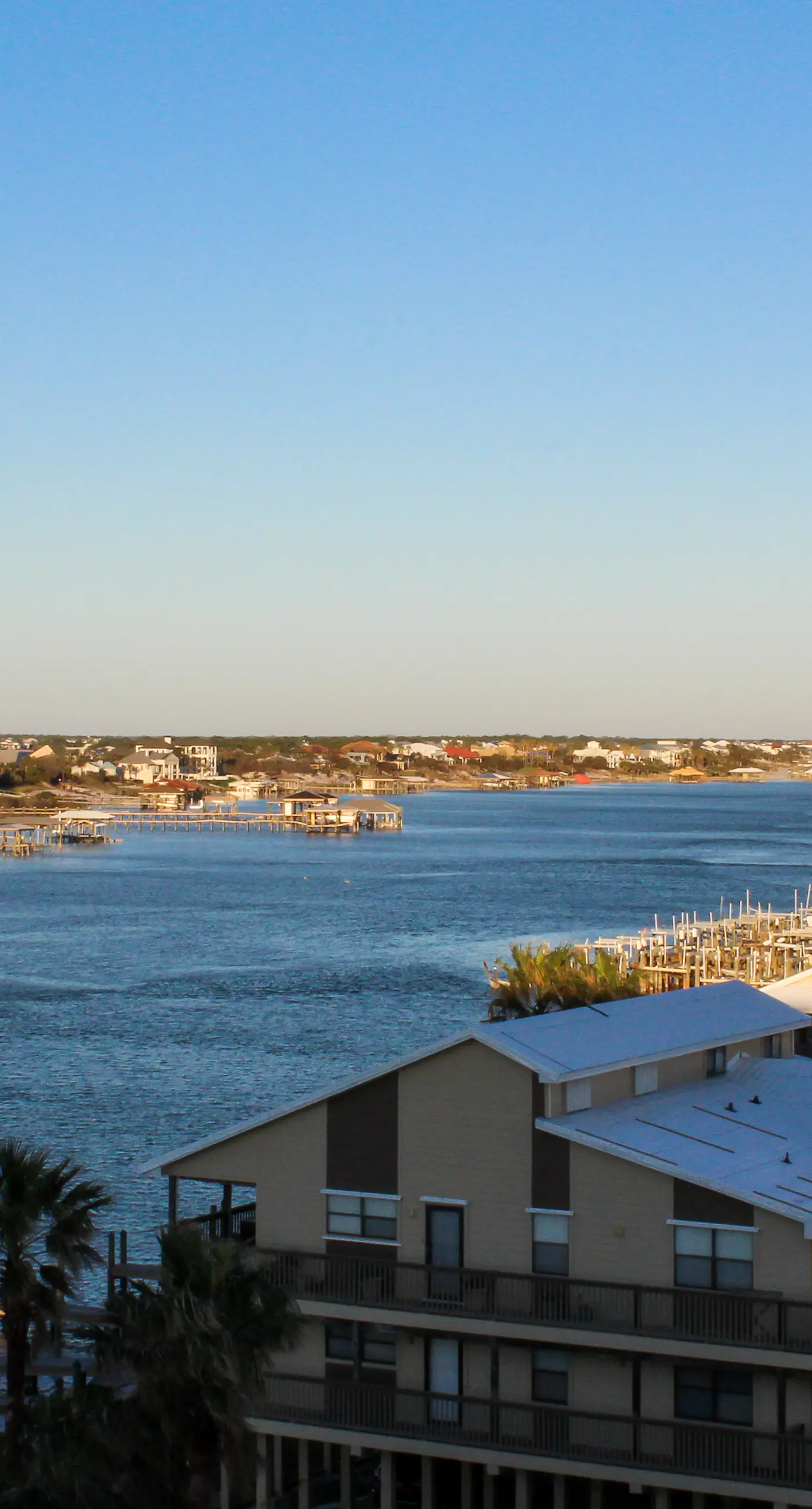 Coastal escape with 2 water-view balconies, 2 pools, tennis & beach access