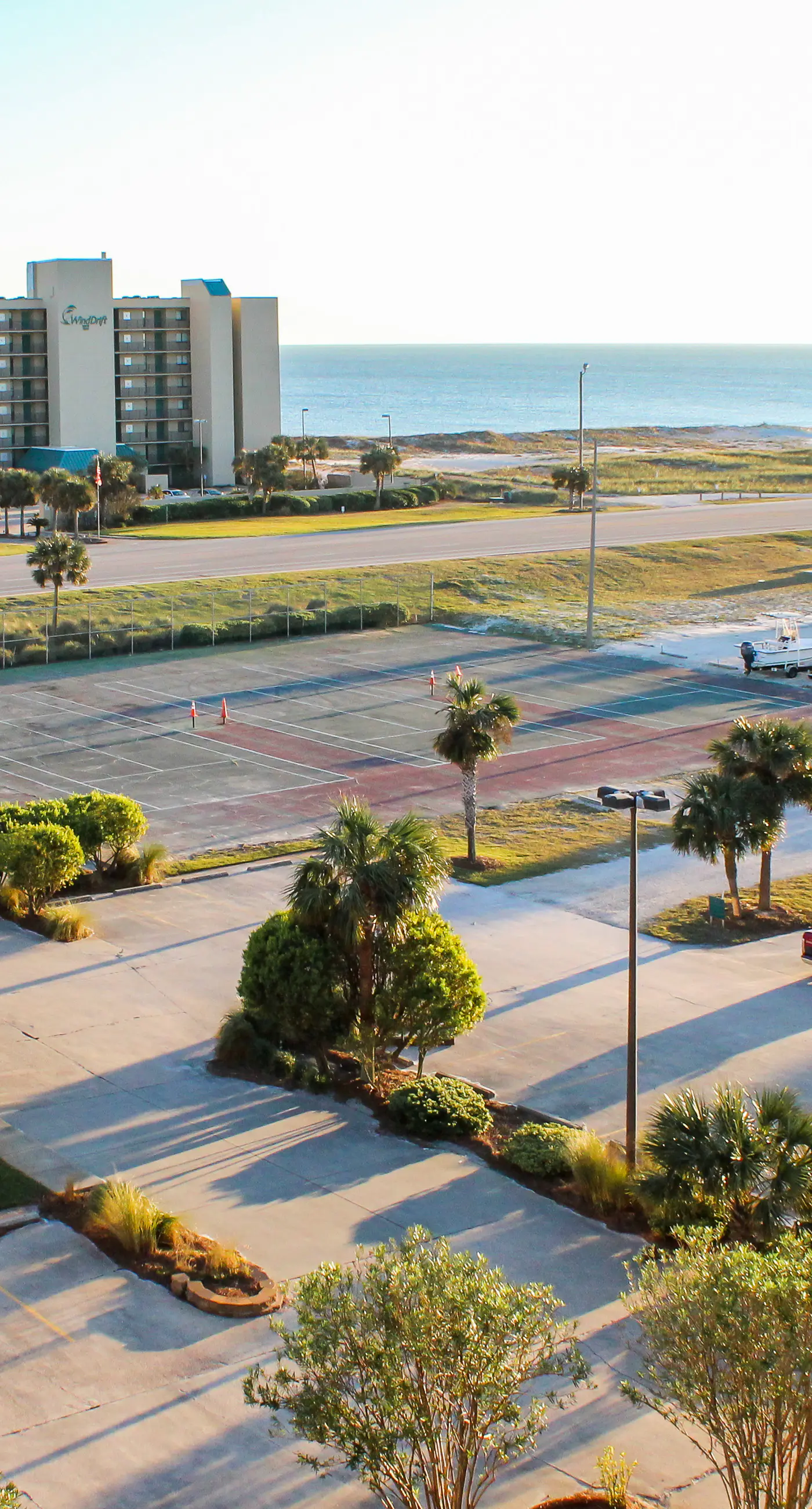 Coastal escape with 2 water-view balconies, 2 pools, tennis & beach access