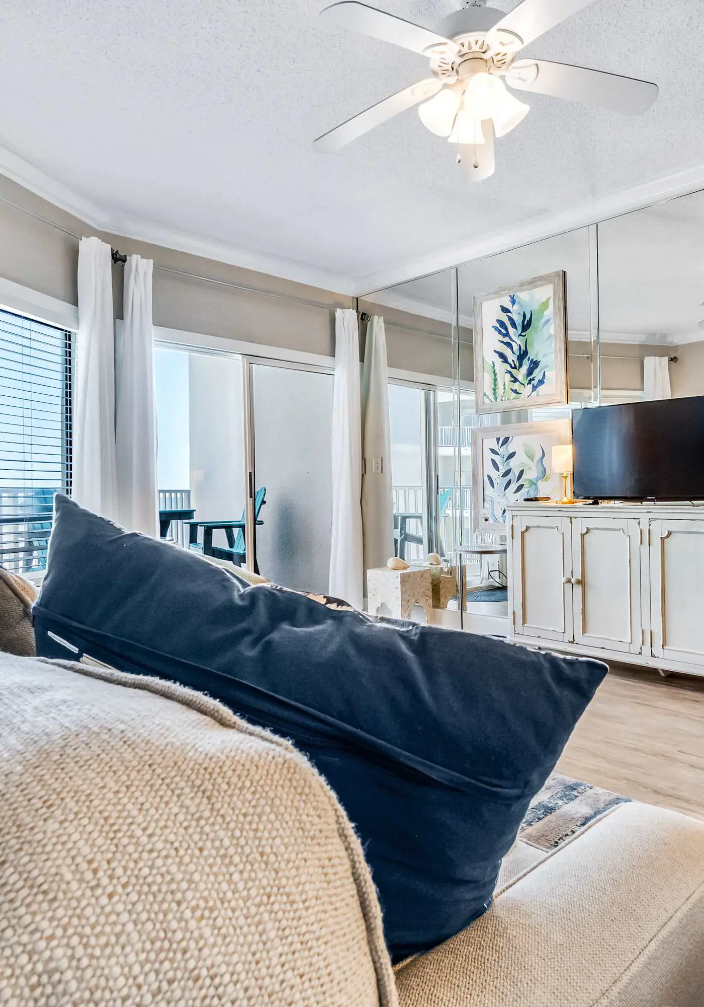 Gulf-view condo in beachfront complex with a balcony, central AC, pools, & gym