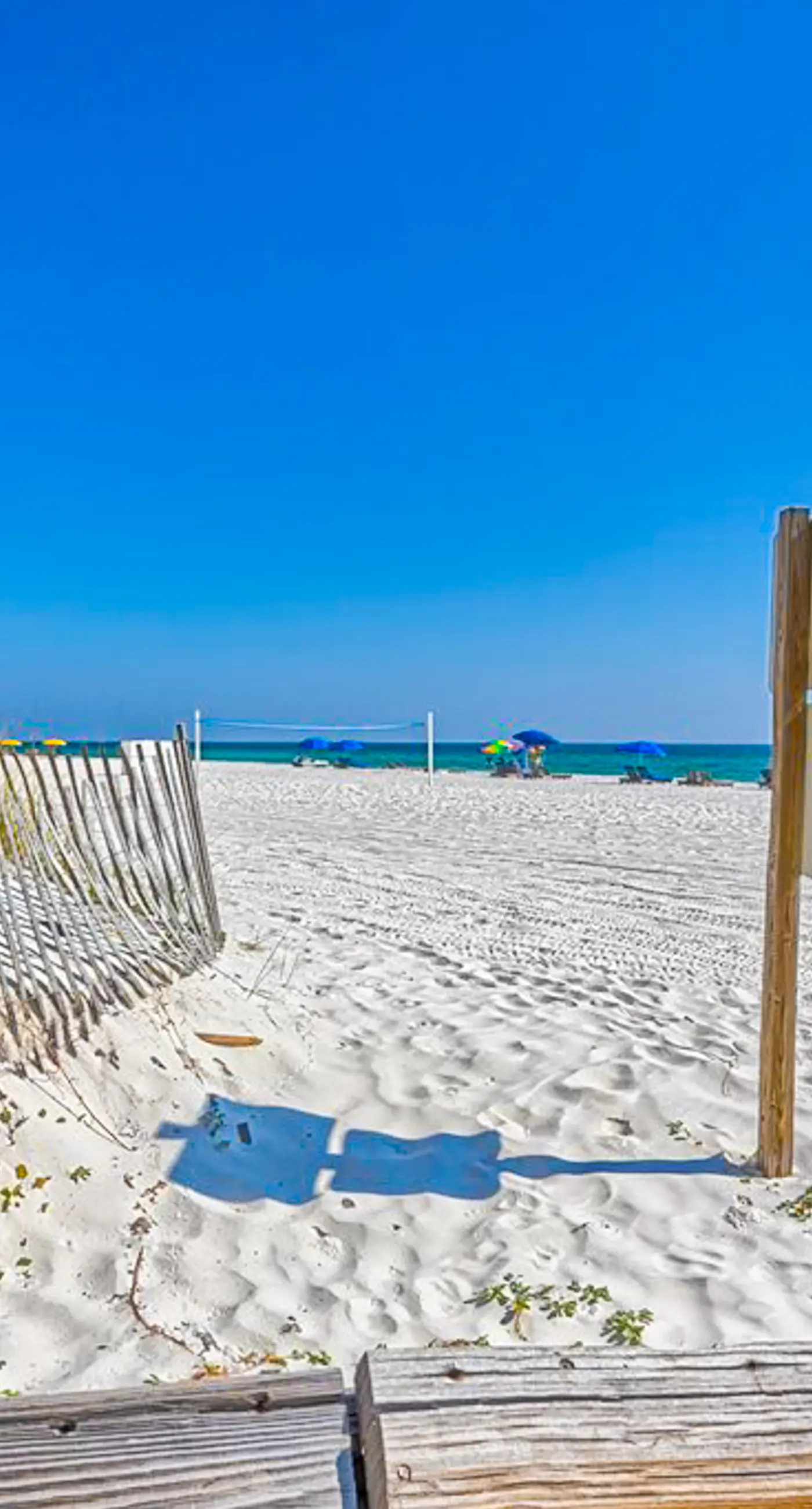 Beachfront condo with Gulf views, balcony, pool, hot tub, sauna & gym