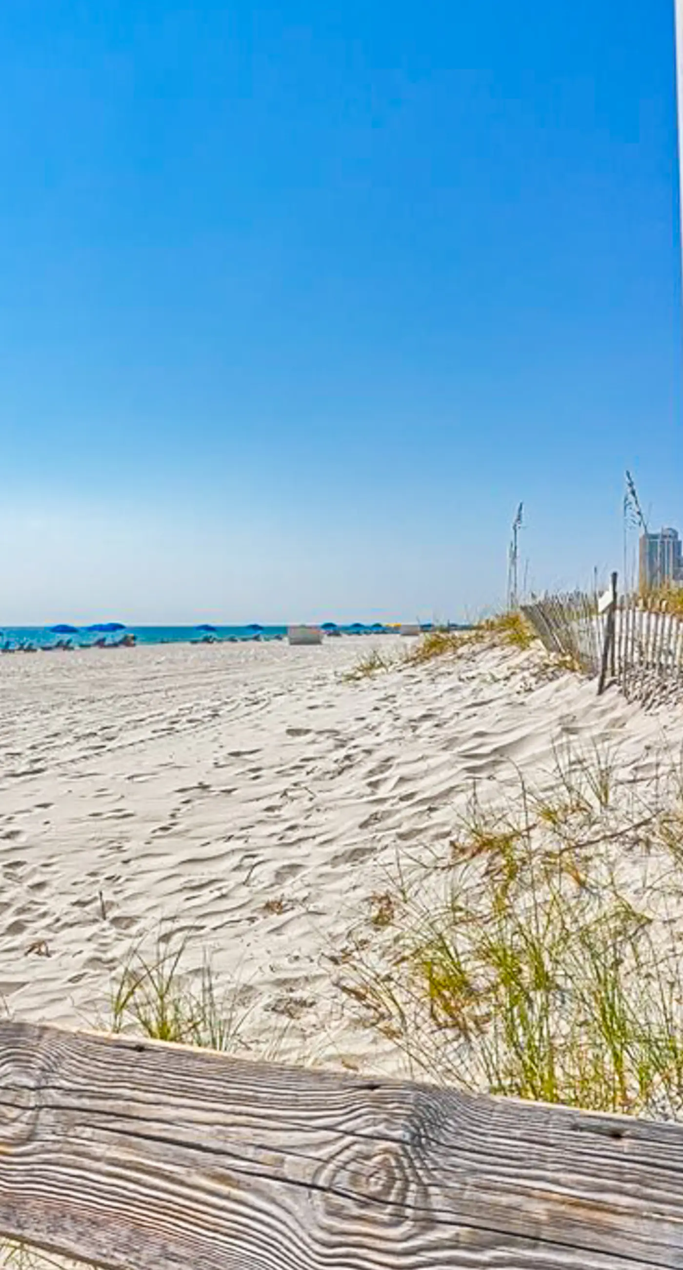 Beachfront condo with Gulf views, balcony, pool, hot tub, sauna & gym