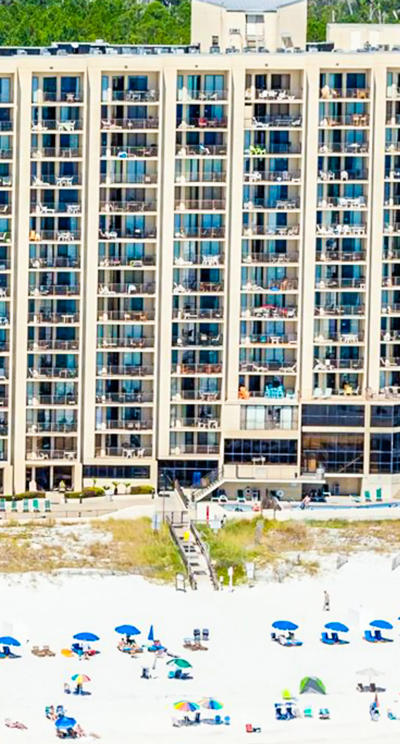 Beachfront condo with Gulf views, balcony, pool, hot tub, sauna & gym