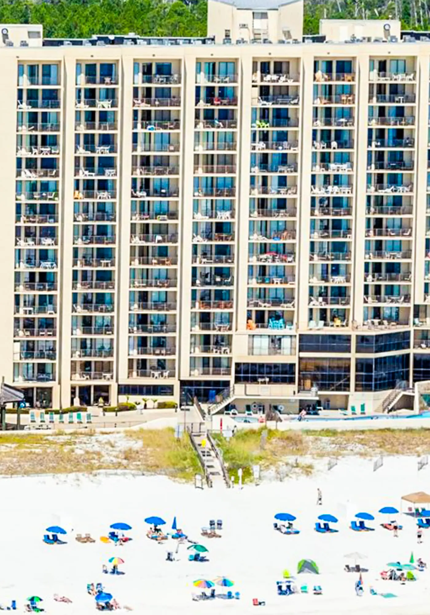 Beachfront condo with Gulf views, balcony, pool, hot tub, sauna & gym