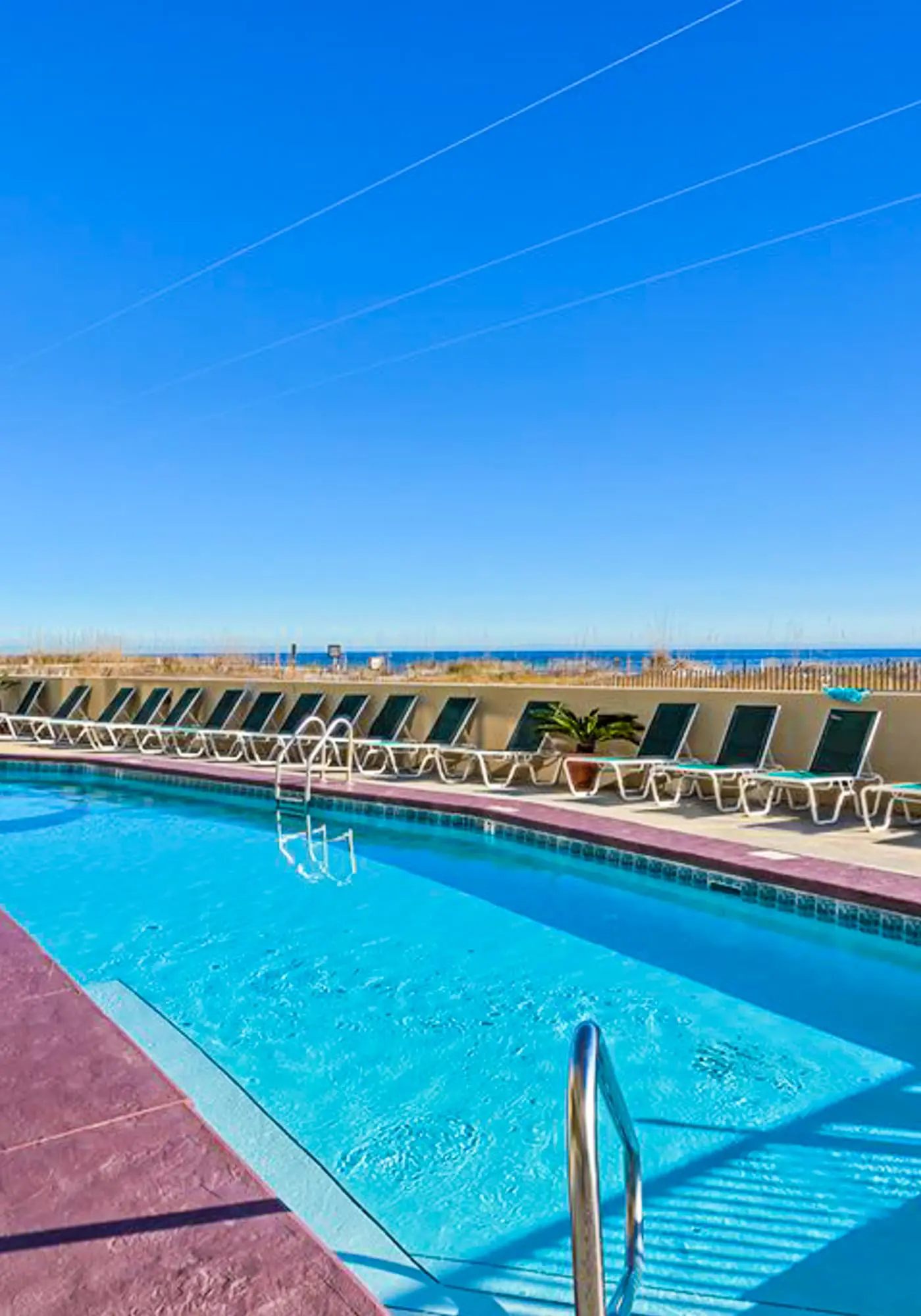 Beachfront condo with Gulf views, balcony, pool, hot tub, sauna & gym