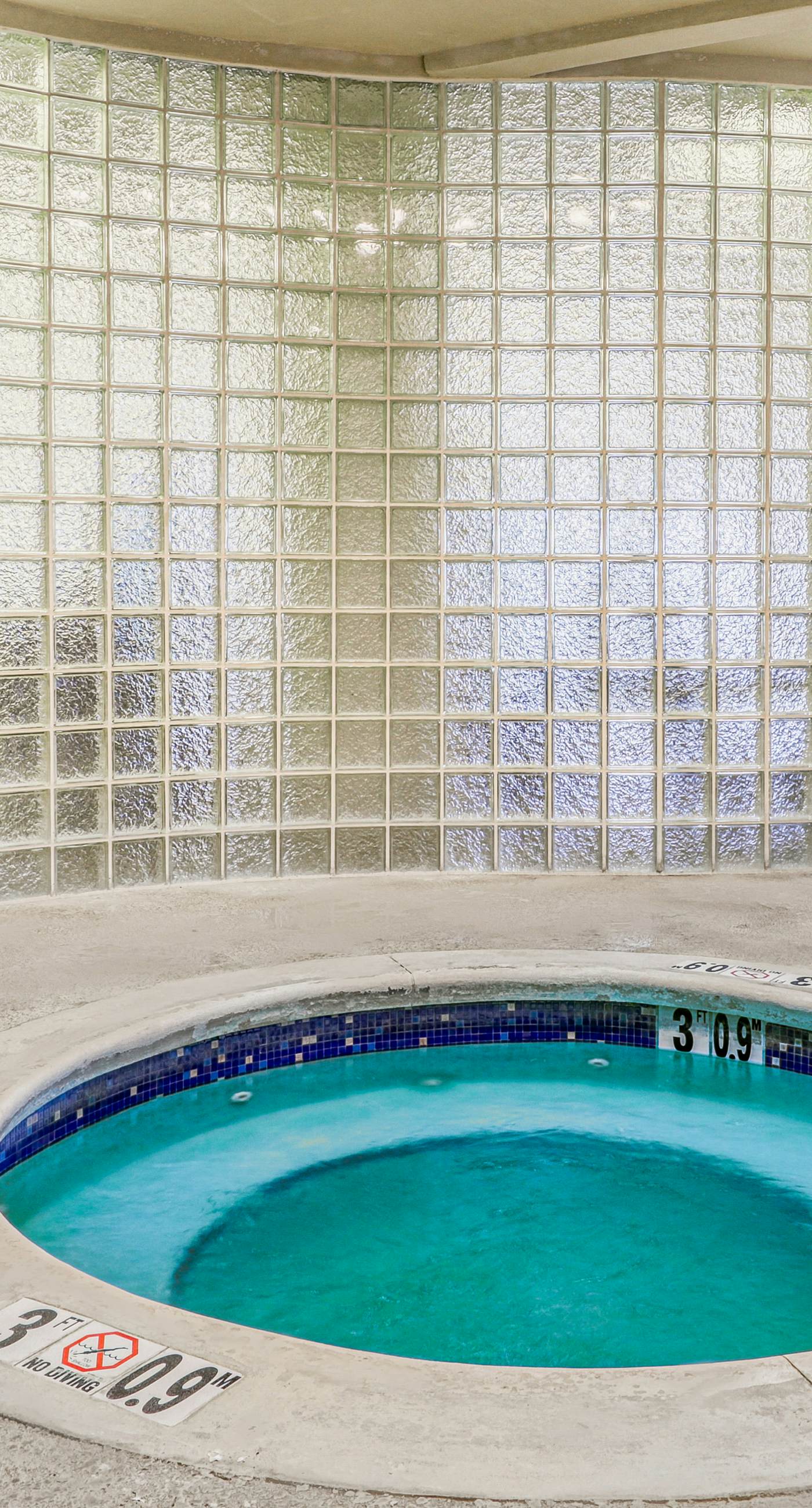 Gulf-front condo with balcony, pool, hot tub, sauna, A/C, & views