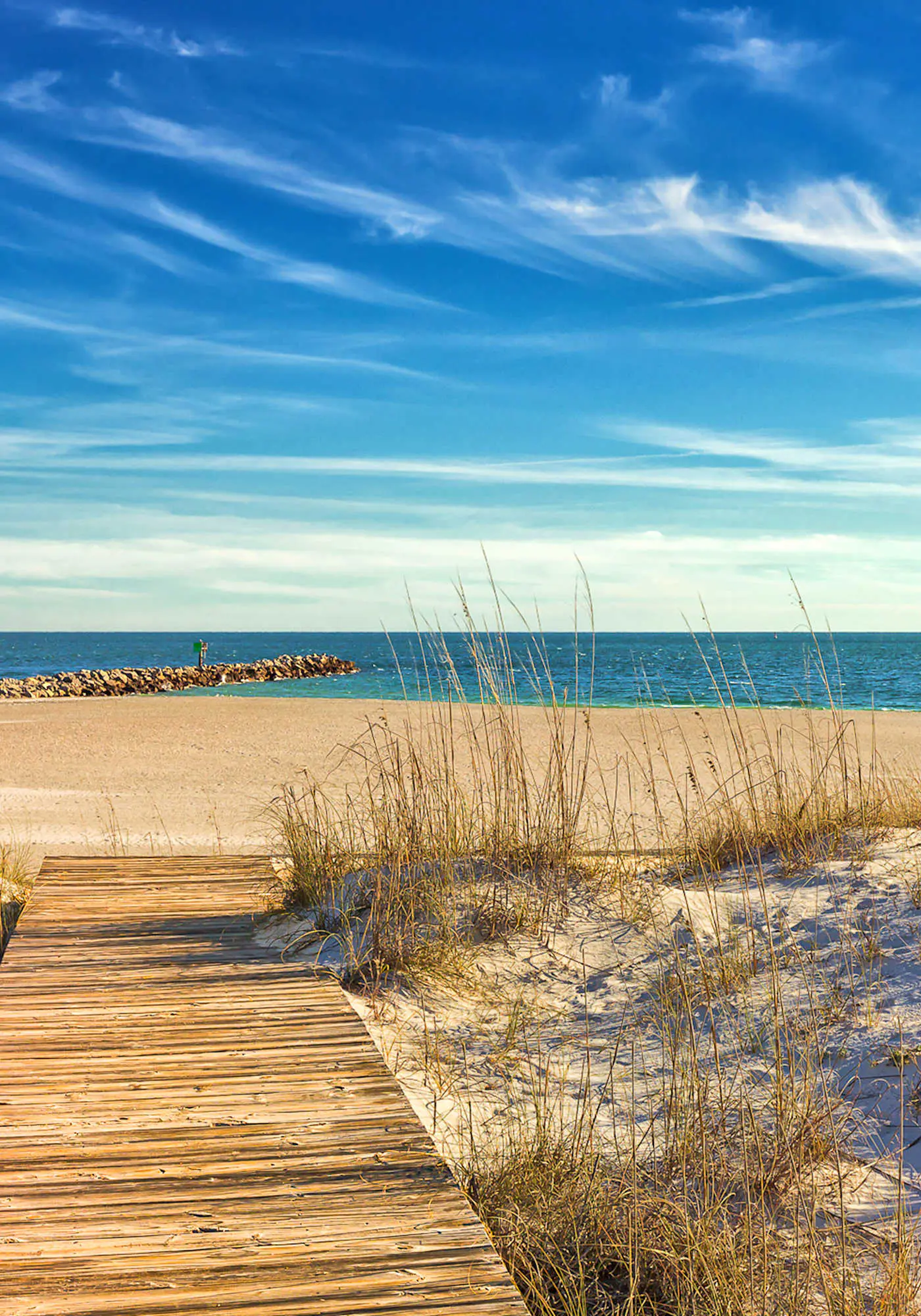 Beach & Gulf-front condo with balcony, hot tub, pool, sauna & gym