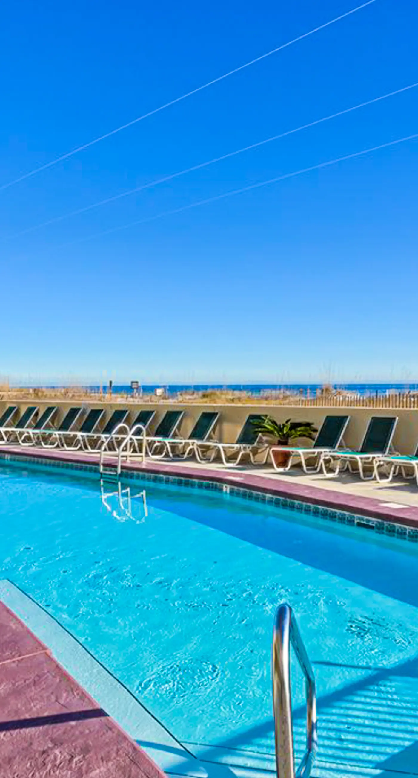 Beachfront condo with Gulf view, balcony, pools, hot tub & gym