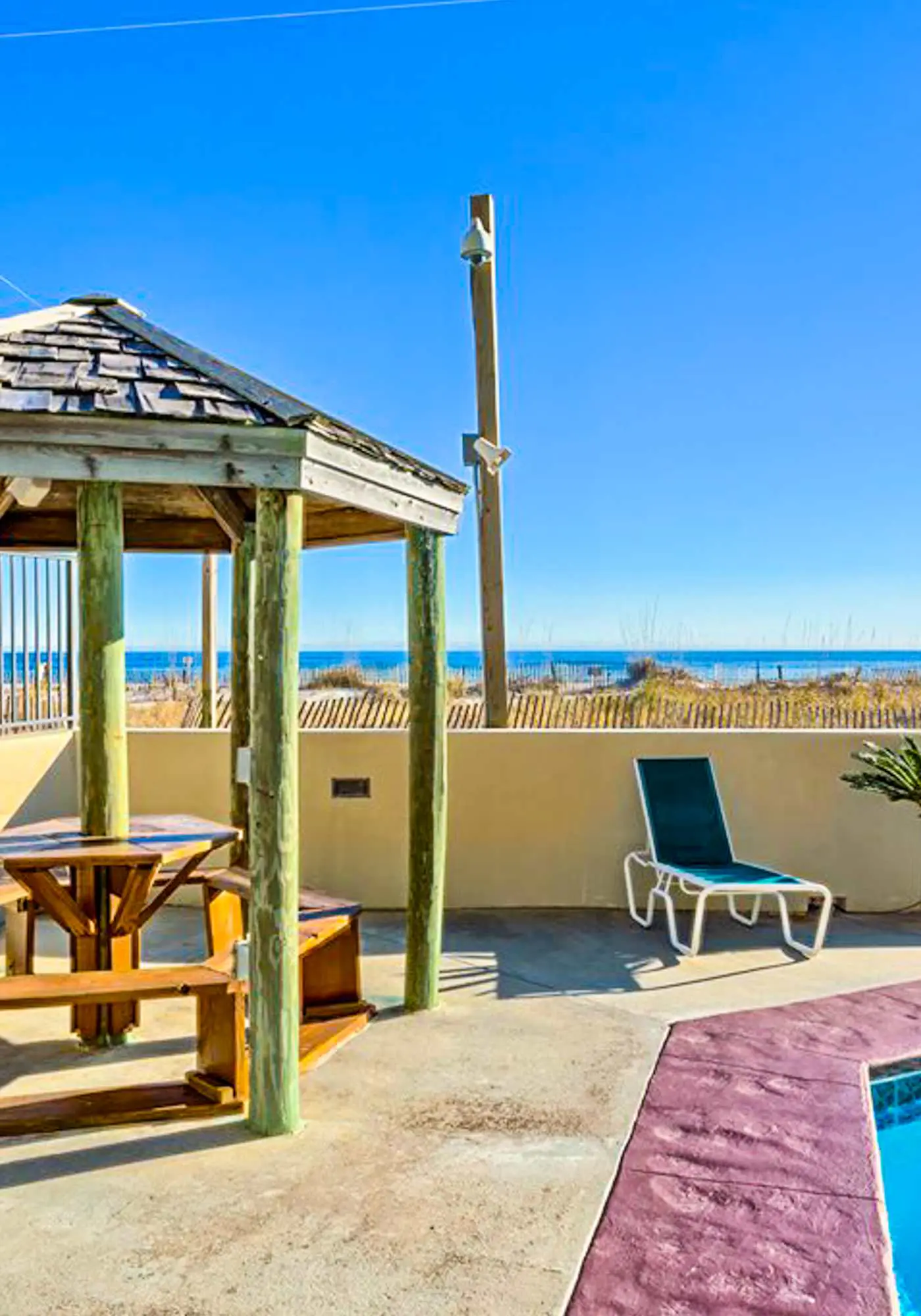 Beachfront condo with Gulf view, balcony, pools, hot tub & gym
