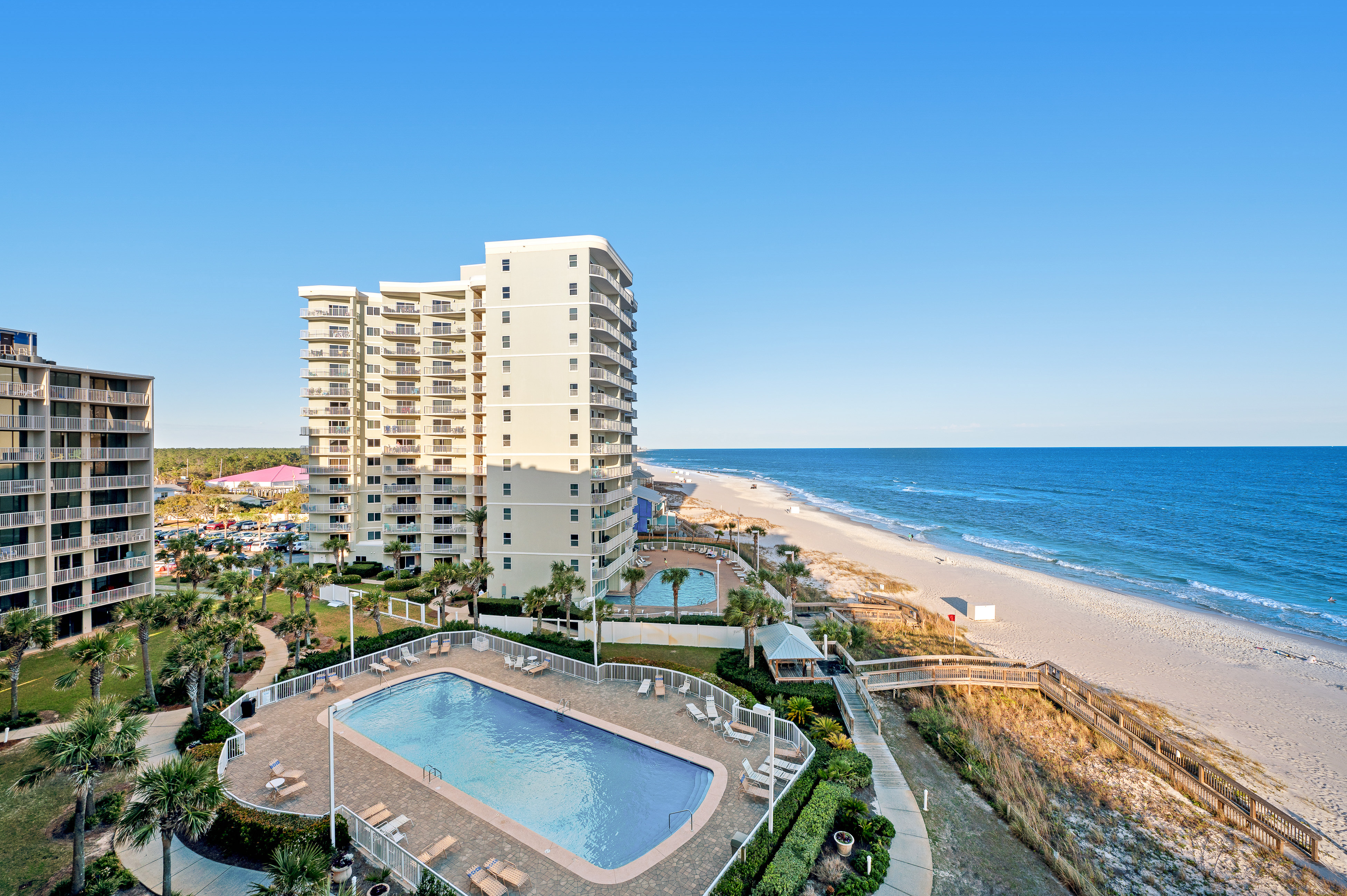 Wonderful beachfront vacation complex with private pool, WiFi, balcony & AC