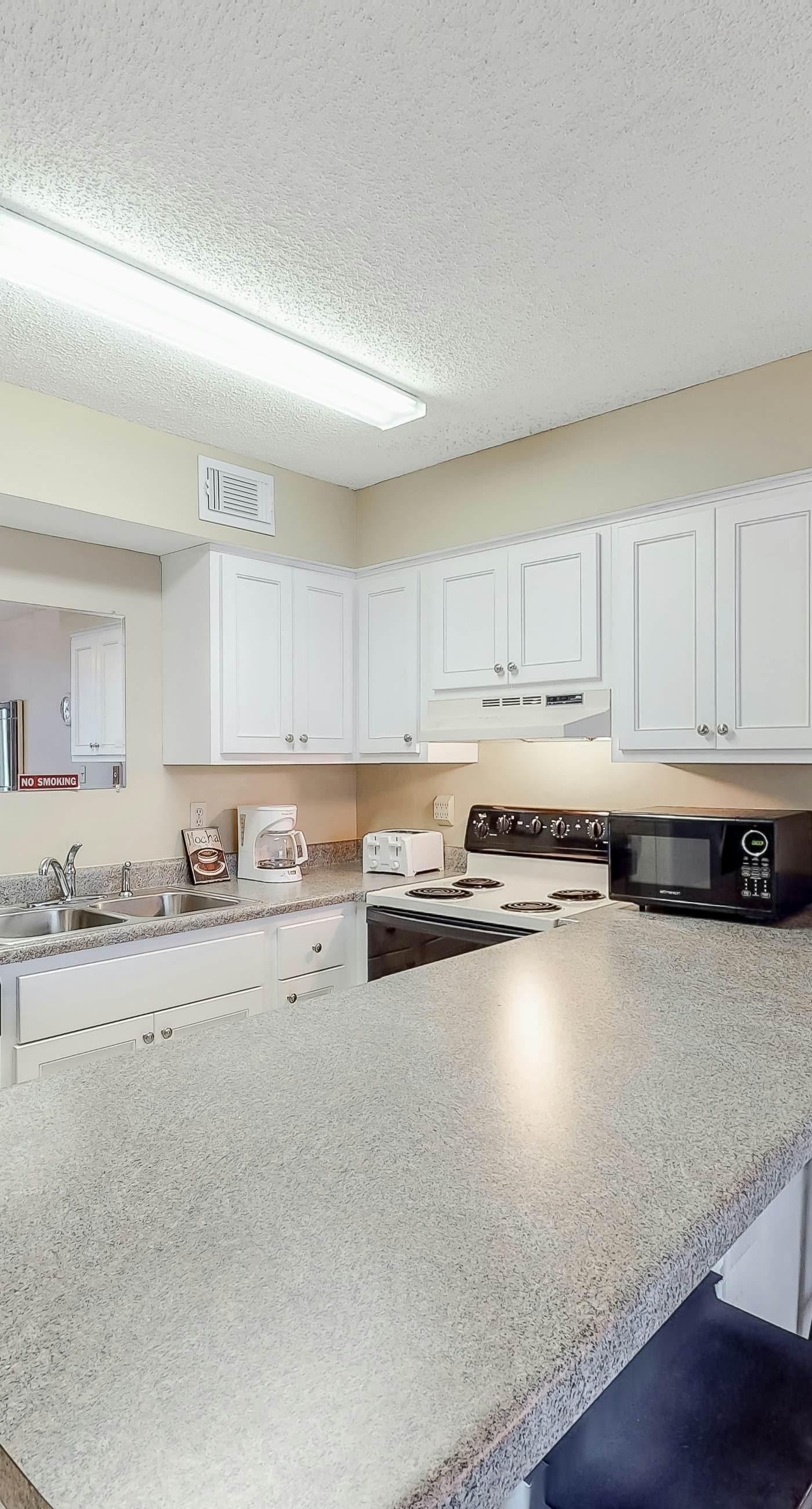 Wonderful beachfront vacation complex with private pool, WiFi, balcony & AC