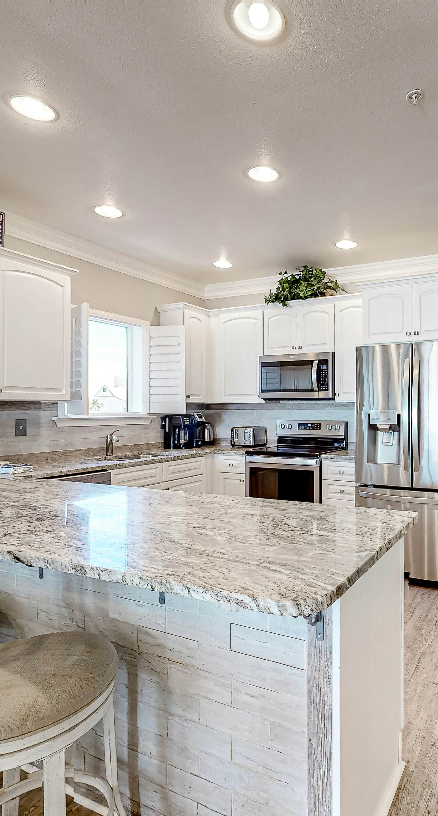 Beachfront Corner Condo with Free WiFi, Furnished Balcony, & a Shared Pool