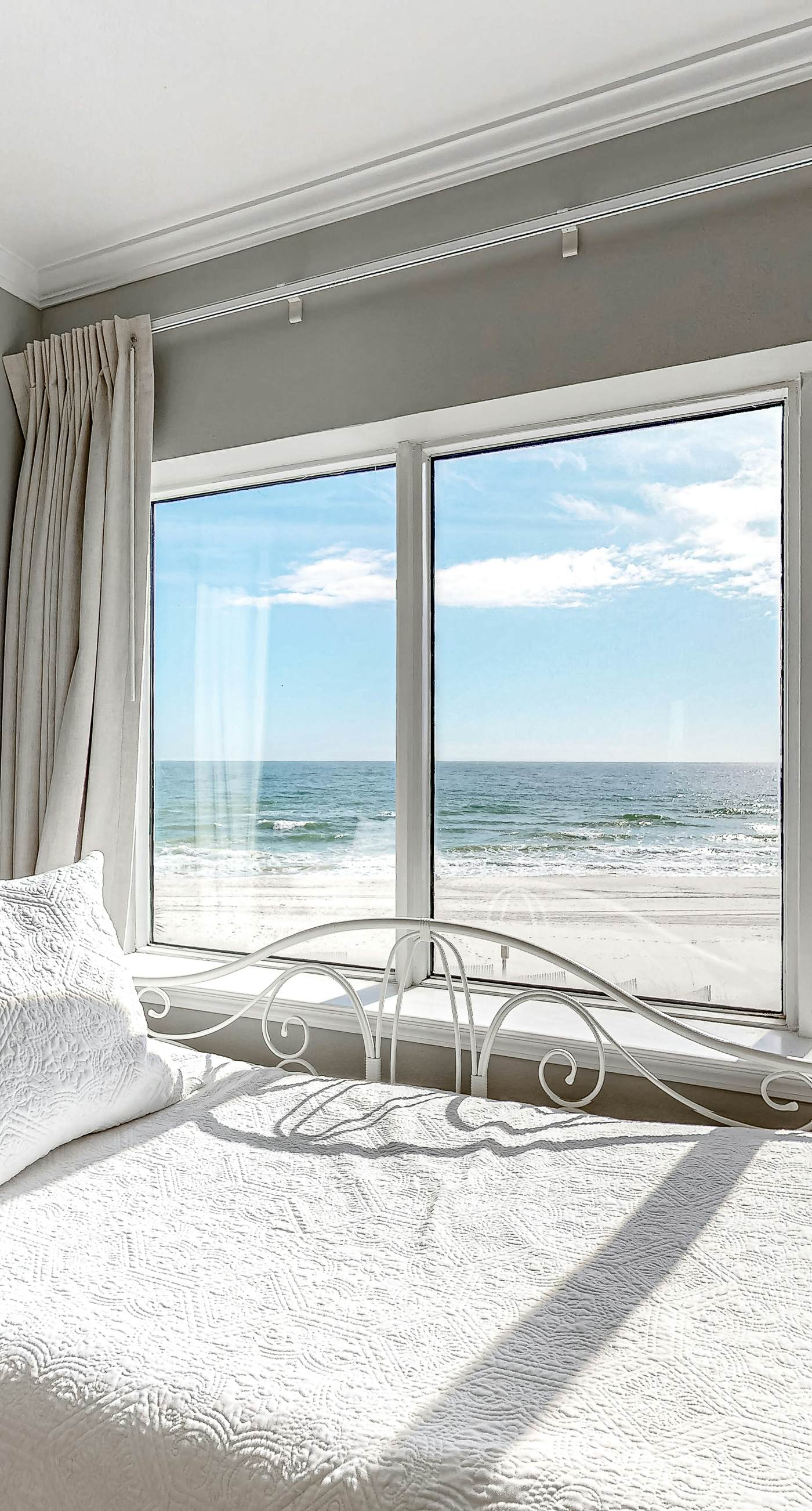 Beachfront Corner Condo with Free WiFi, Furnished Balcony, & a Shared Pool