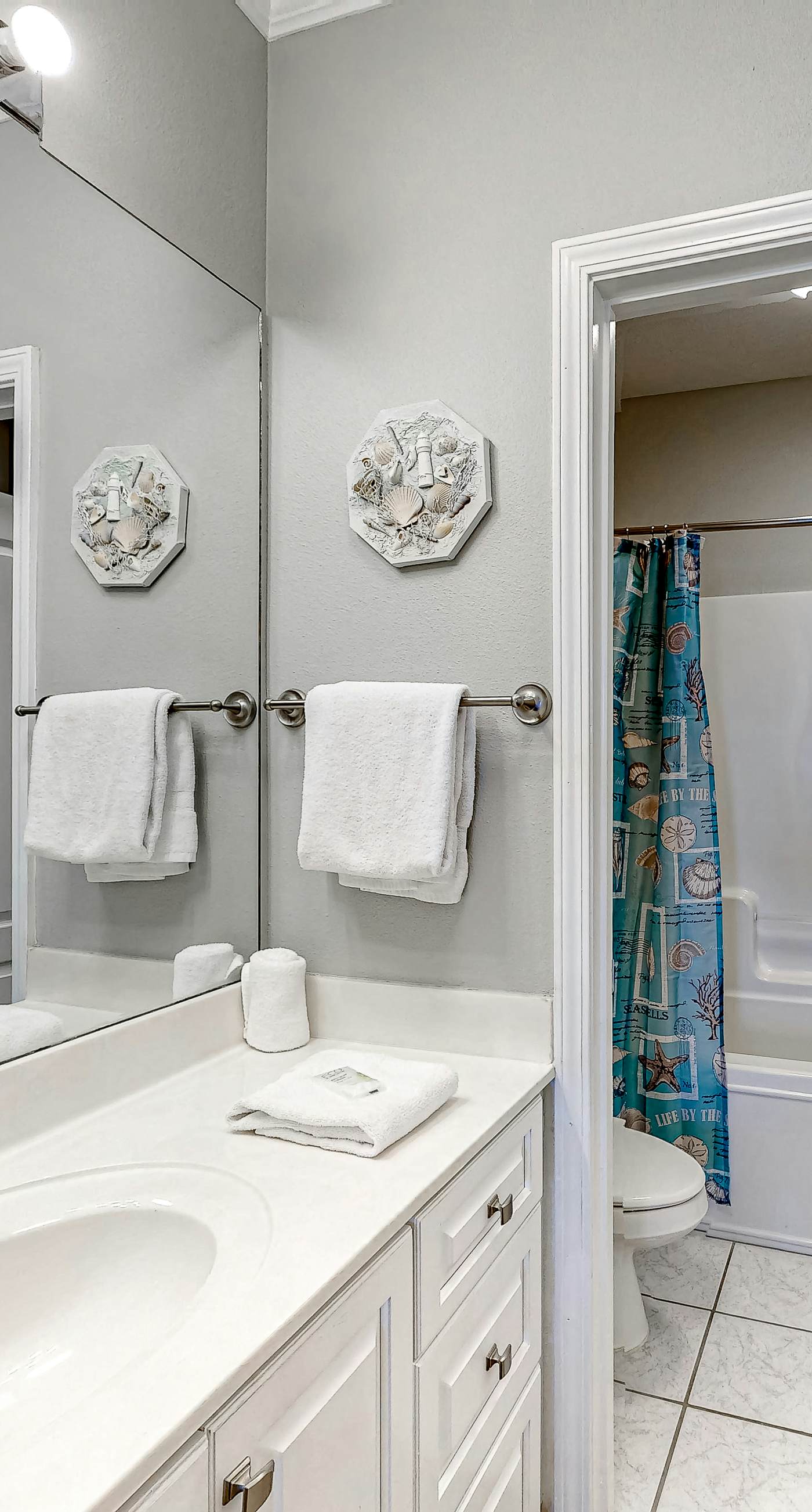 Beachfront Corner Condo with Free WiFi, Furnished Balcony, & a Shared Pool