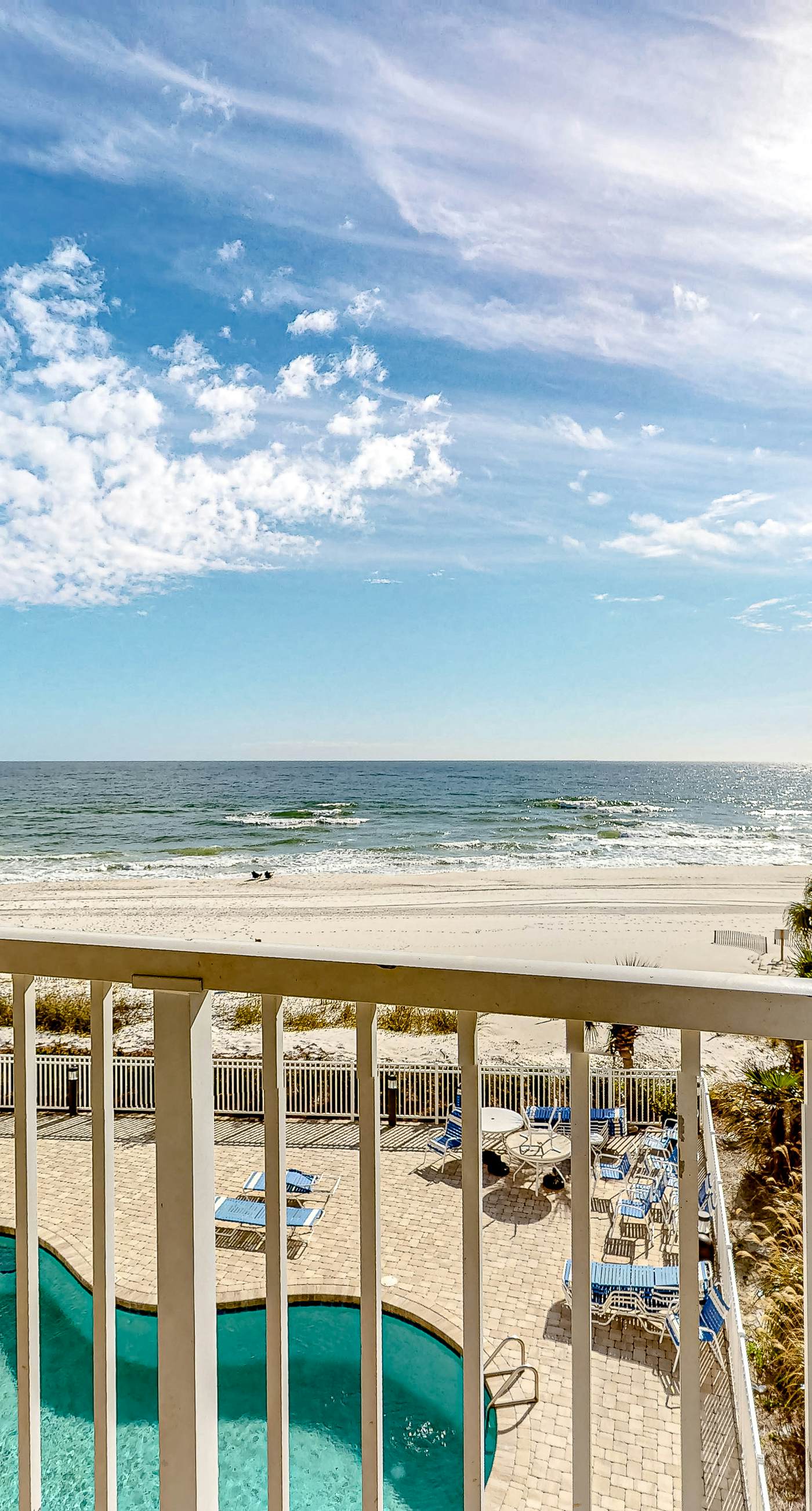 Beachfront Corner Condo with Free WiFi, Furnished Balcony, & a Shared Pool