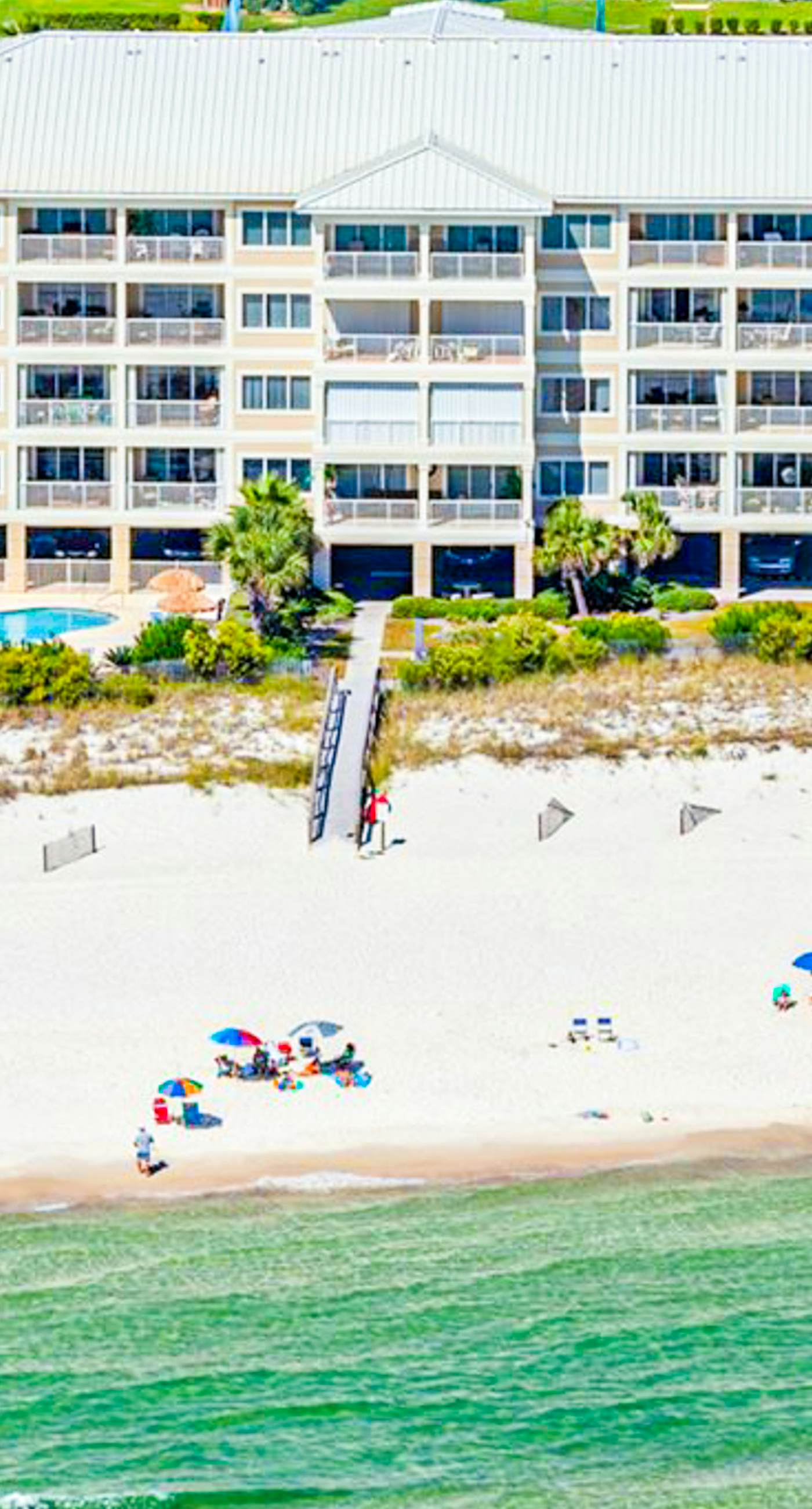 Beachfront Corner Condo with Free WiFi, Furnished Balcony, & a Shared Pool