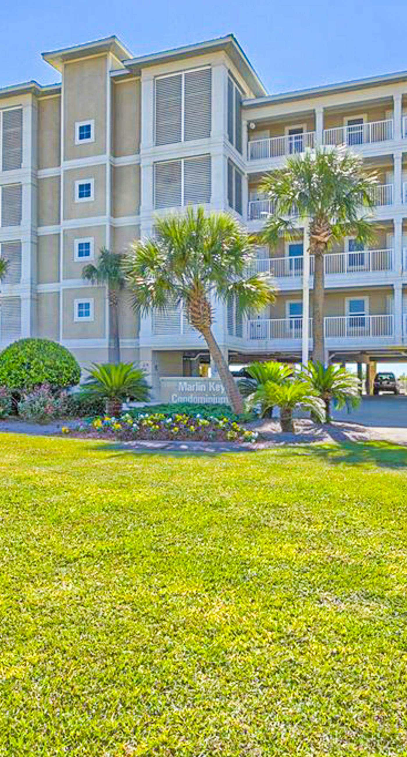 Beachfront Corner Condo with Free WiFi, Furnished Balcony, & a Shared Pool