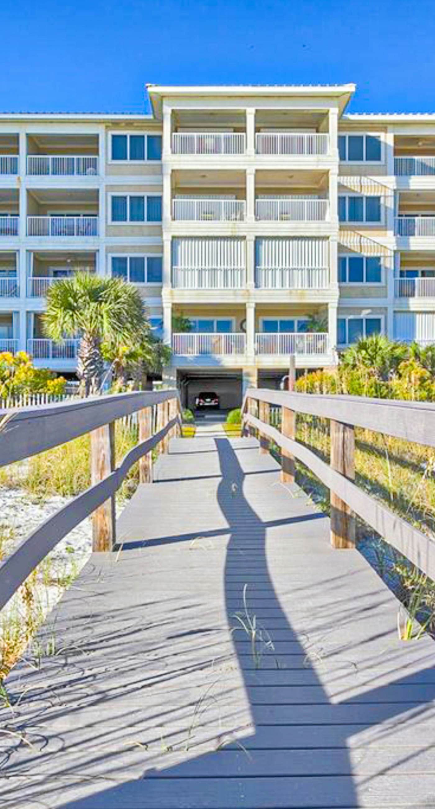 Beachfront Corner Condo with Free WiFi, Furnished Balcony, & a Shared Pool