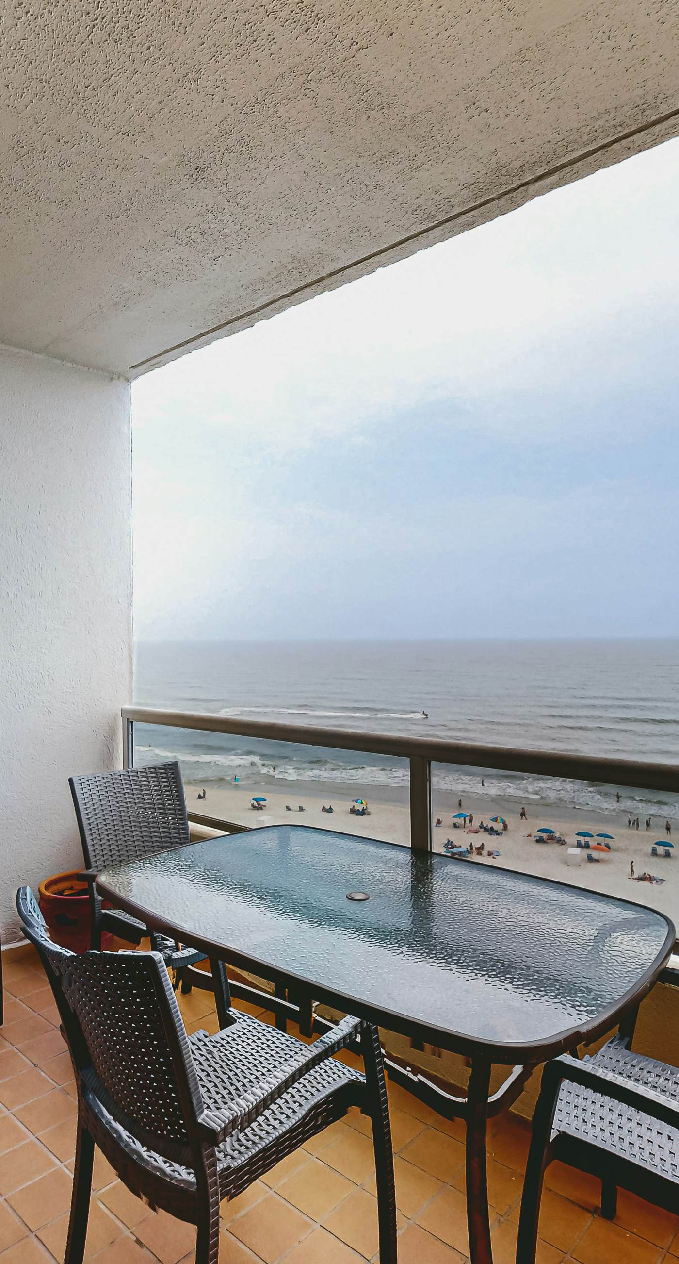 Beachfront resort condo with shared pool, tennis court, free WiFi, central AC