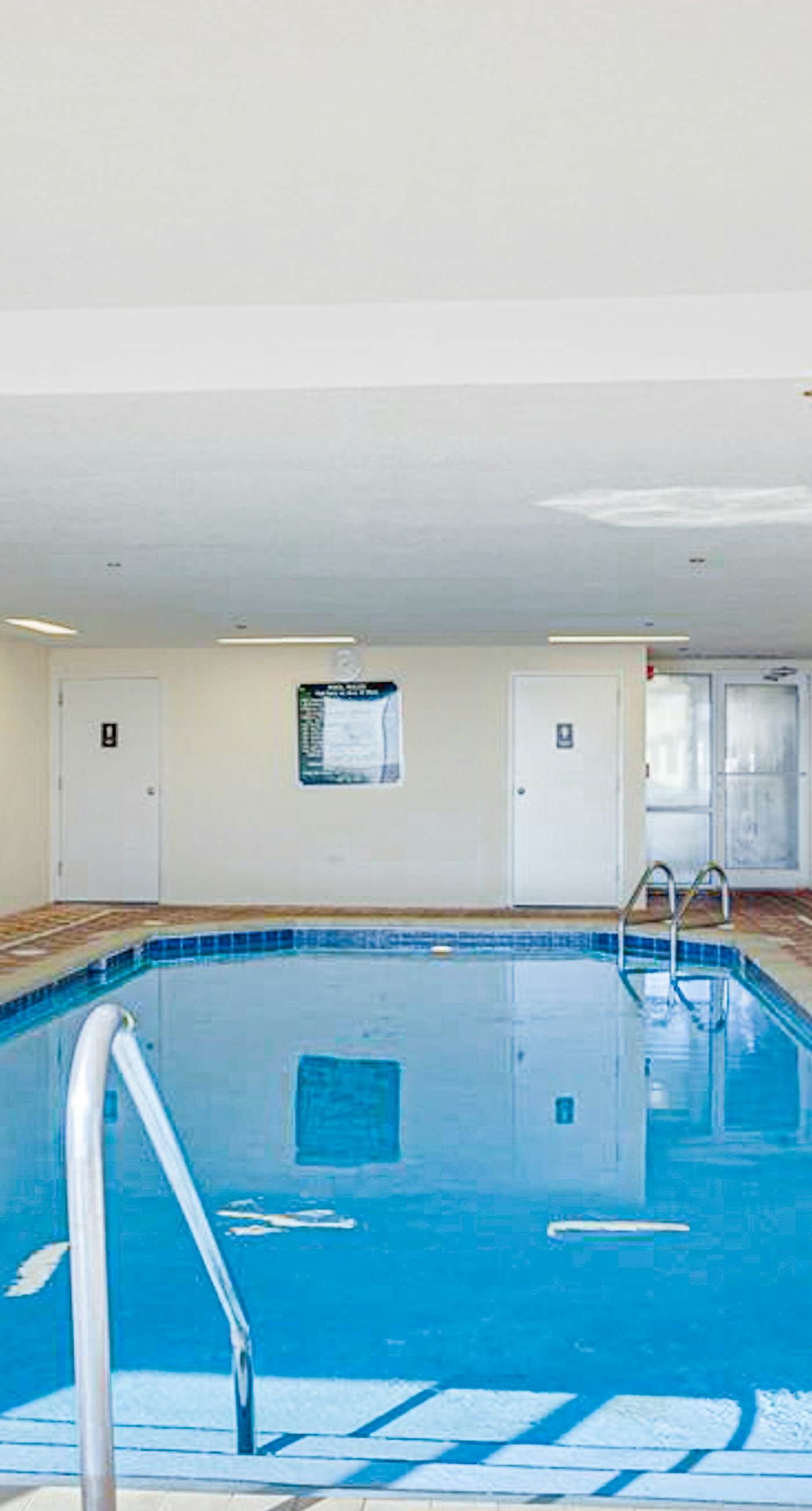 Beachfront resort condo with shared pool, tennis court, free WiFi, central AC