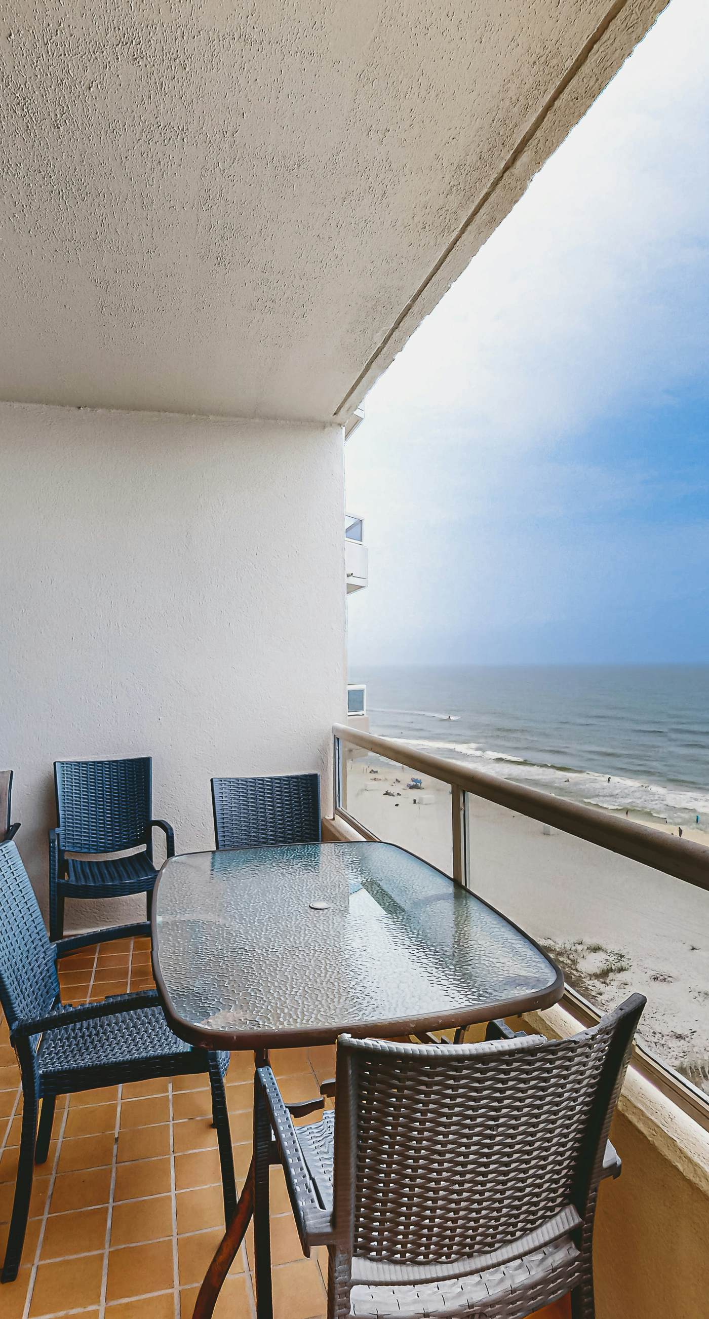 Beachfront resort condo with shared pool, tennis court, free WiFi, central AC