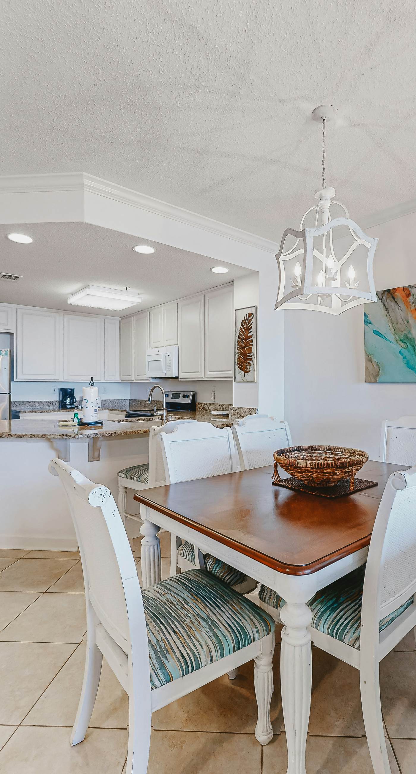 Beachfront resort condo with shared pool, tennis court, free WiFi, central AC