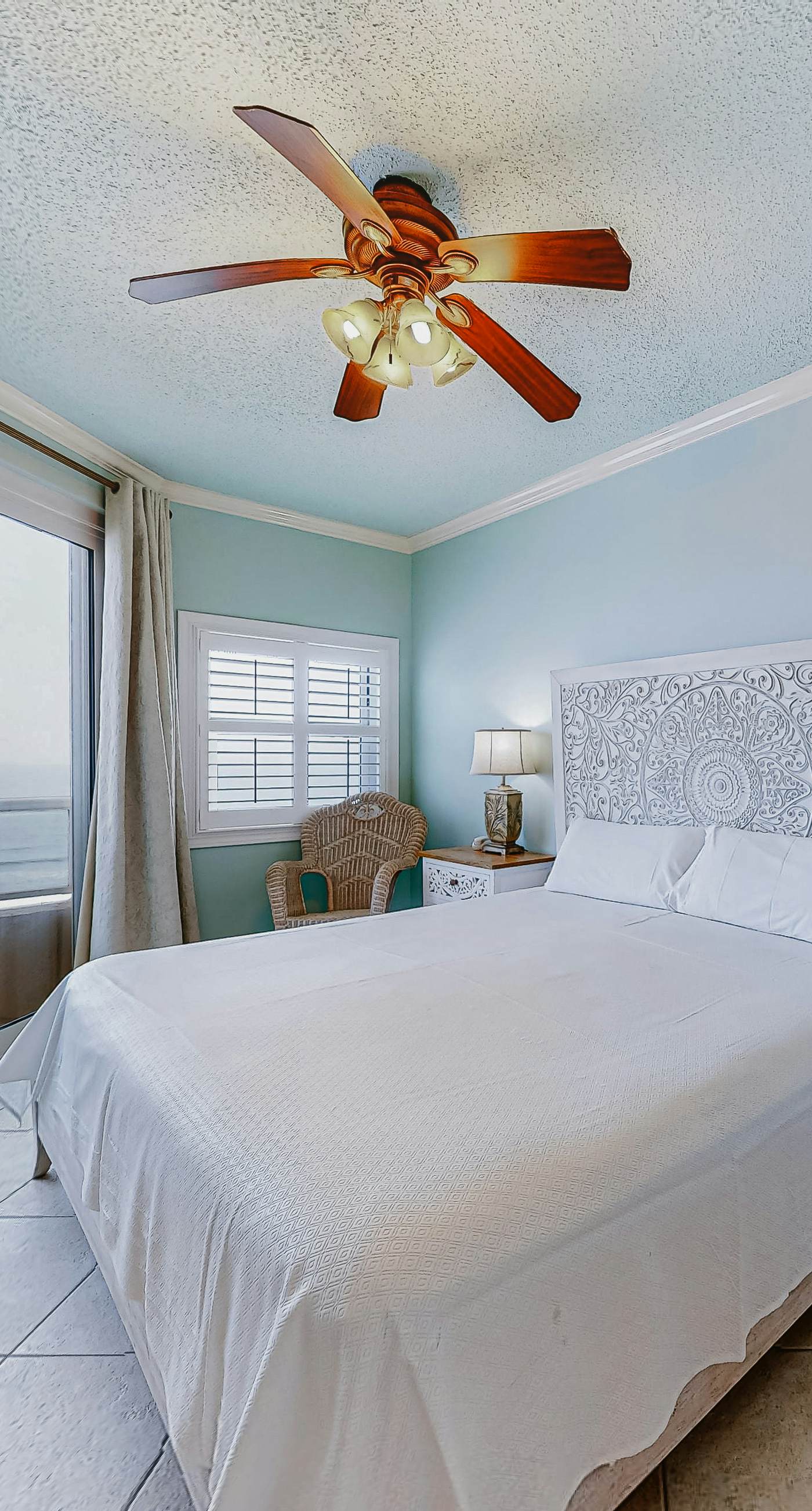 Beachfront resort condo with shared pool, tennis court, free WiFi, central AC