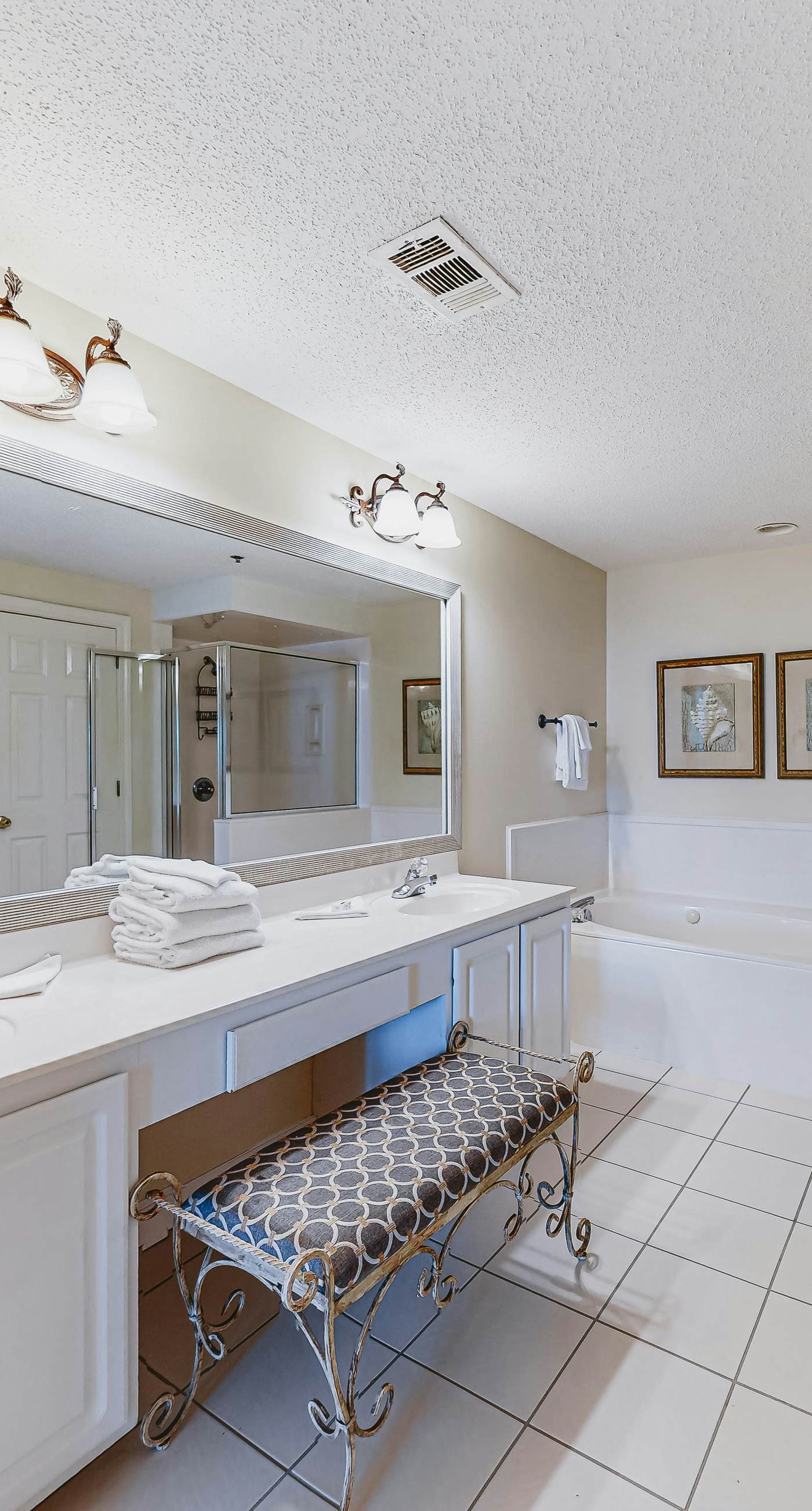 Beachfront resort condo with shared pool, tennis court, free WiFi, central AC