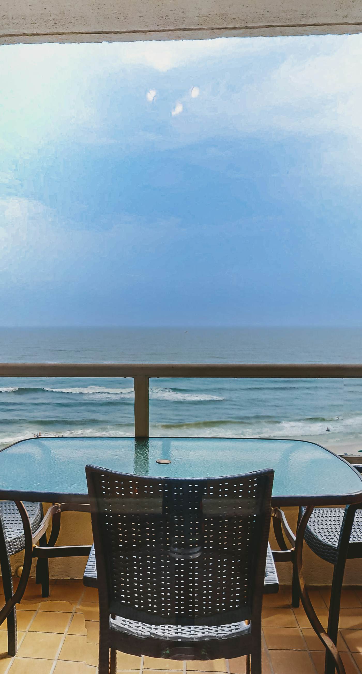 Beachfront resort condo with shared pool, tennis court, free WiFi, central AC