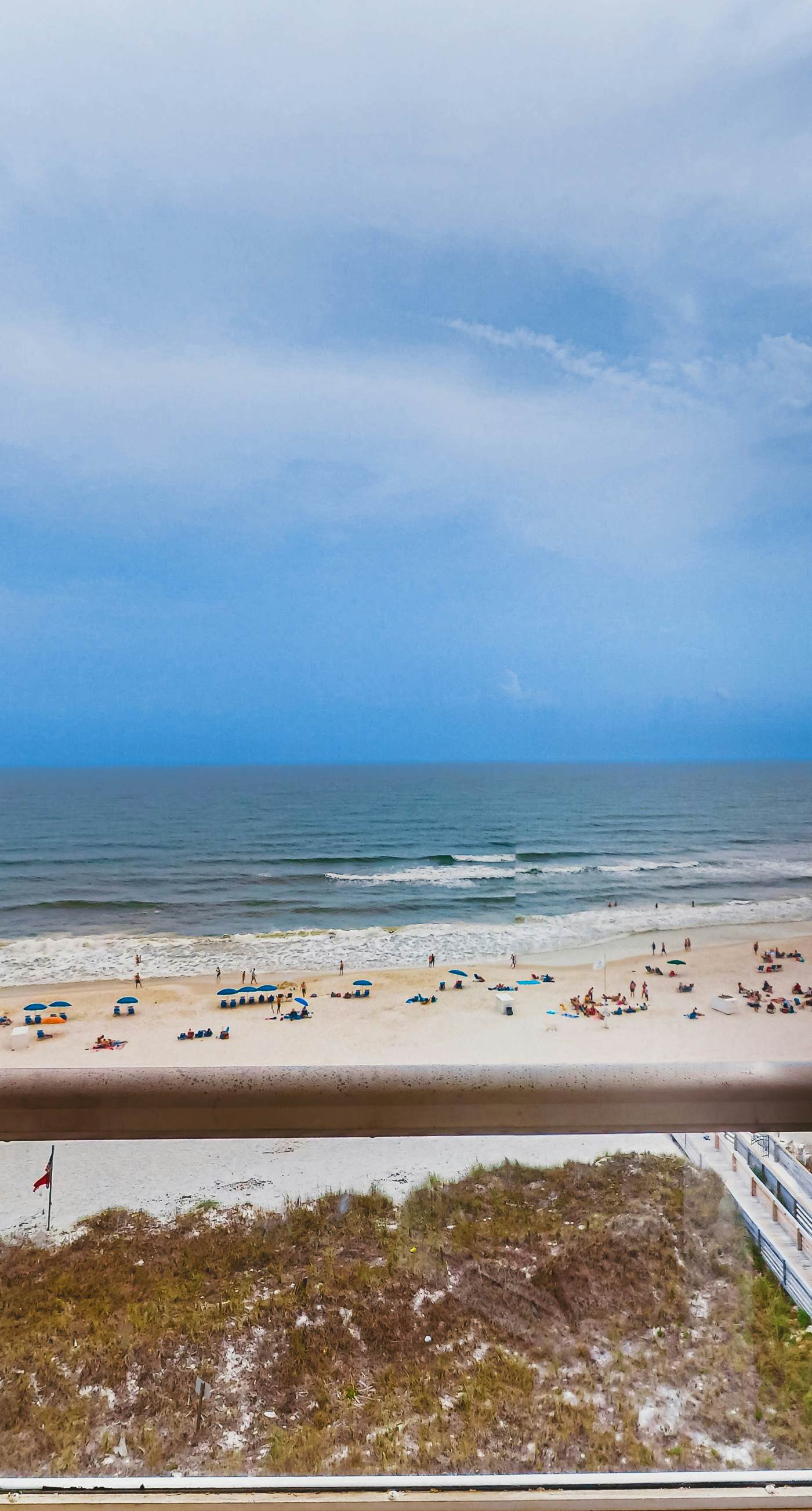 Beachfront resort condo with shared pool, tennis court, free WiFi, central AC