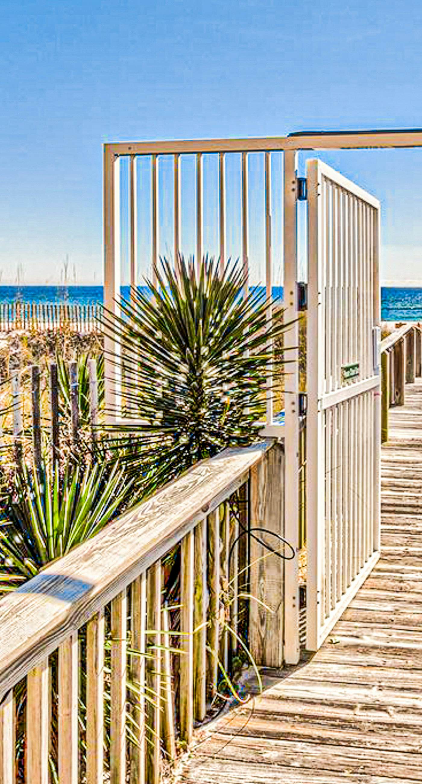 Beachfront resort condo with shared pool, tennis court, free WiFi, central AC