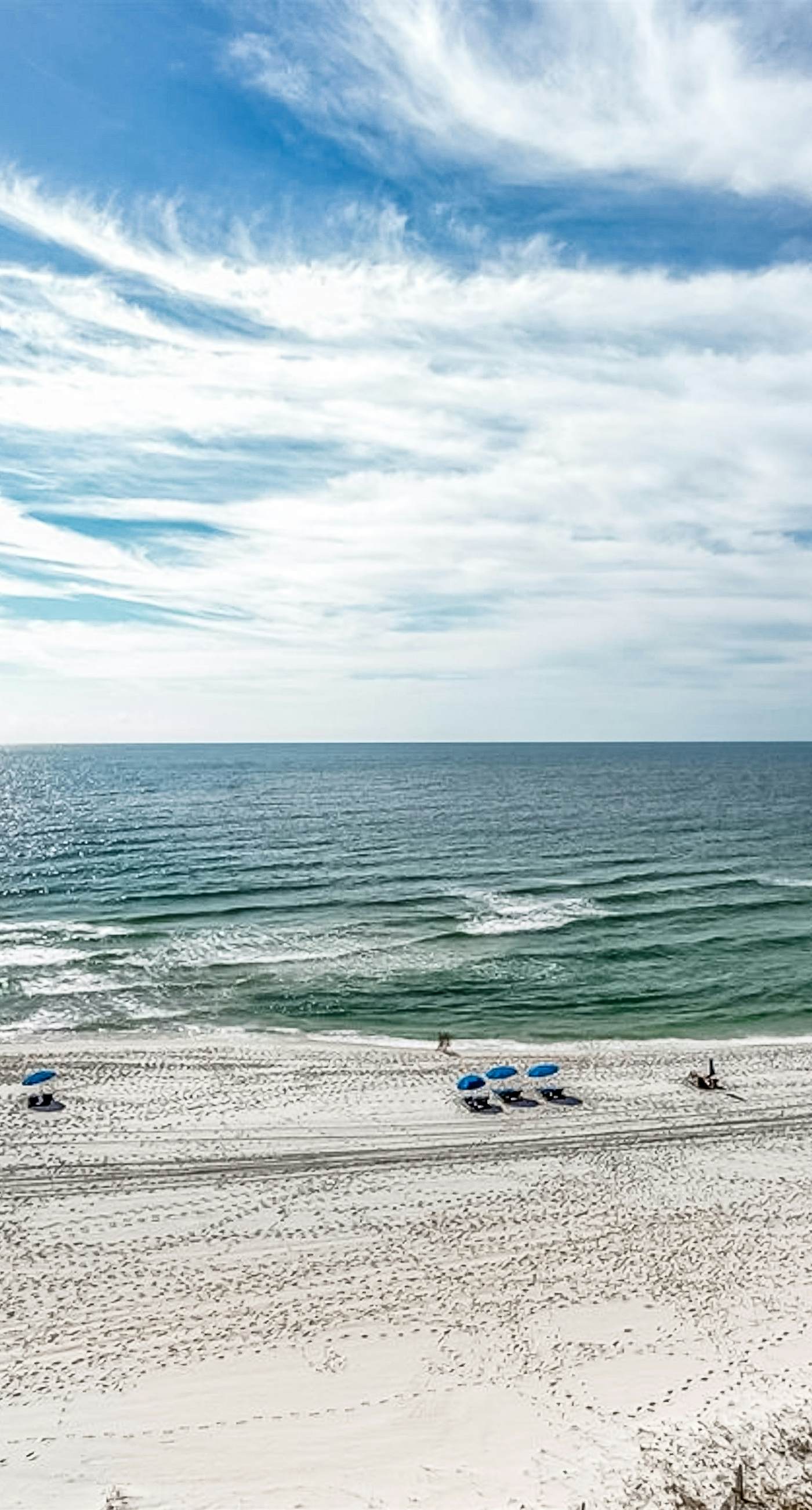 Beachfront resort condo with shared pool, tennis court, free WiFi, central AC