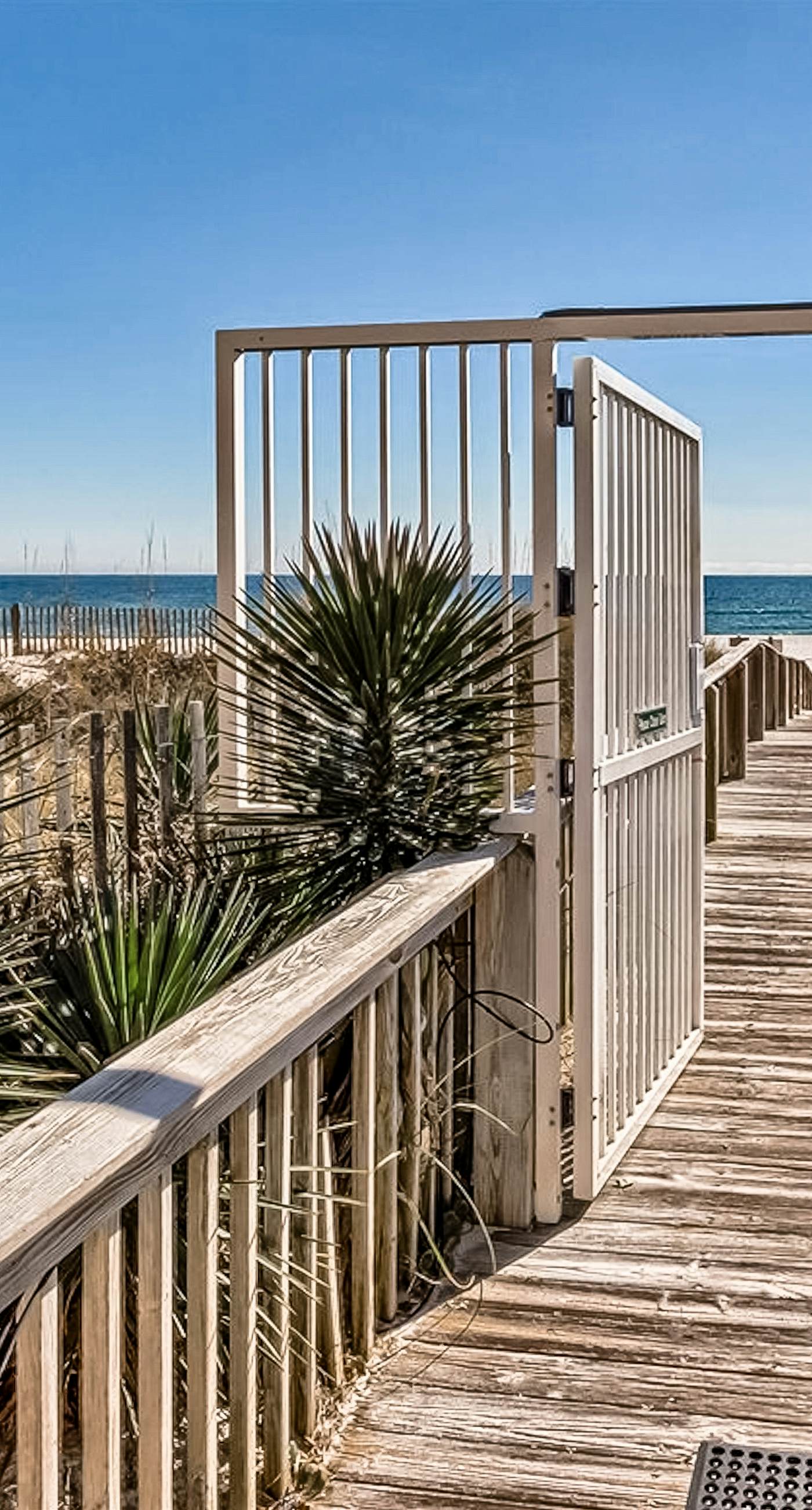 Beachfront resort condo with shared pool, tennis court, free WiFi, central AC