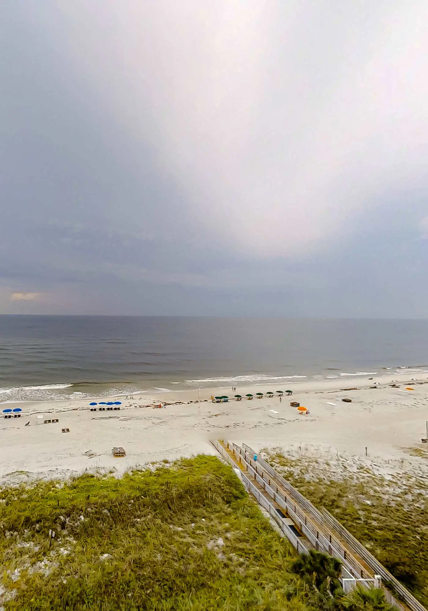 Beachfront resort condo with shared pool, tennis court, free WiFi, central AC