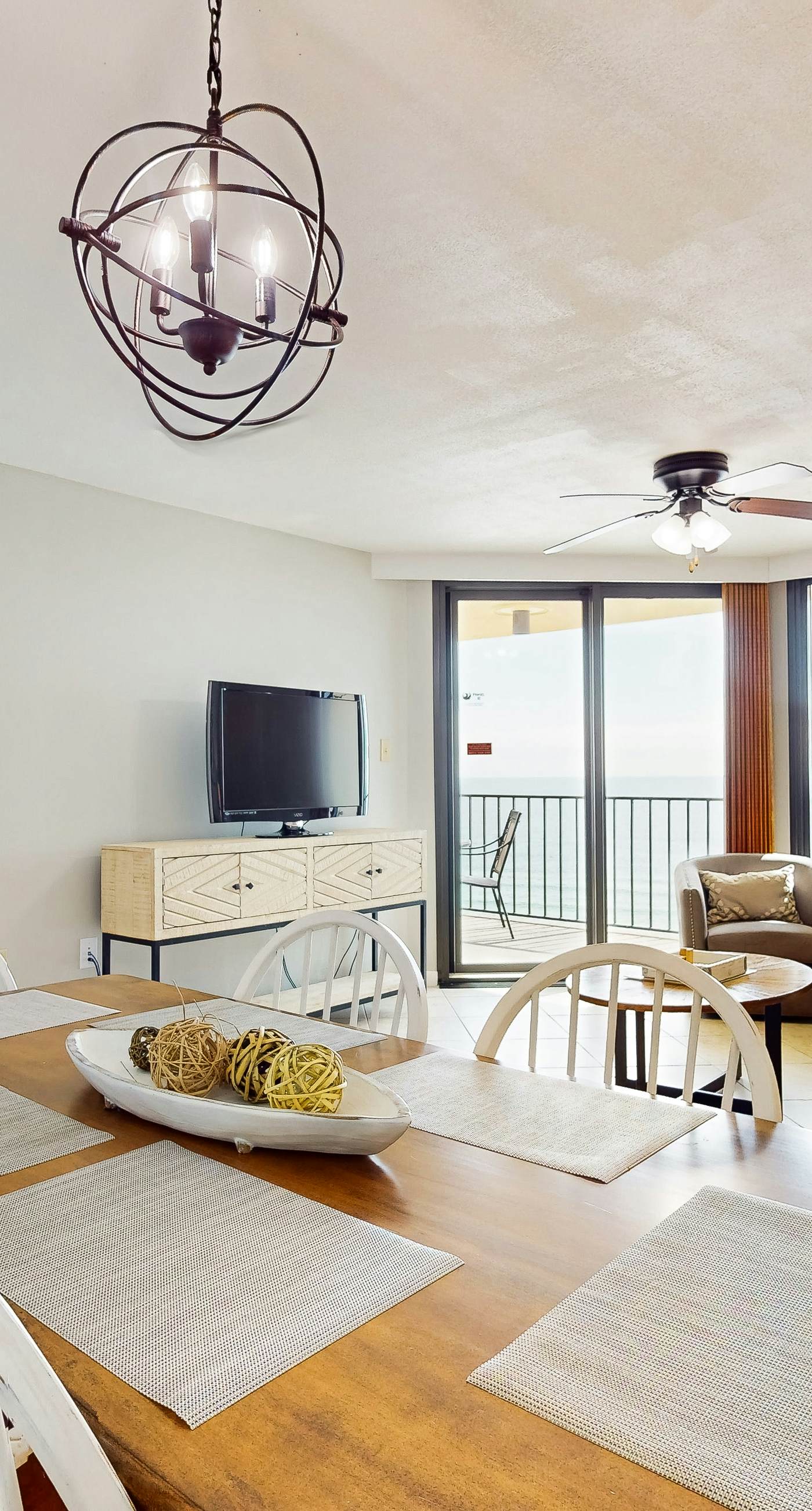 Renovated beachfront condo with balcony, central AC, pool, hot tub & tennis