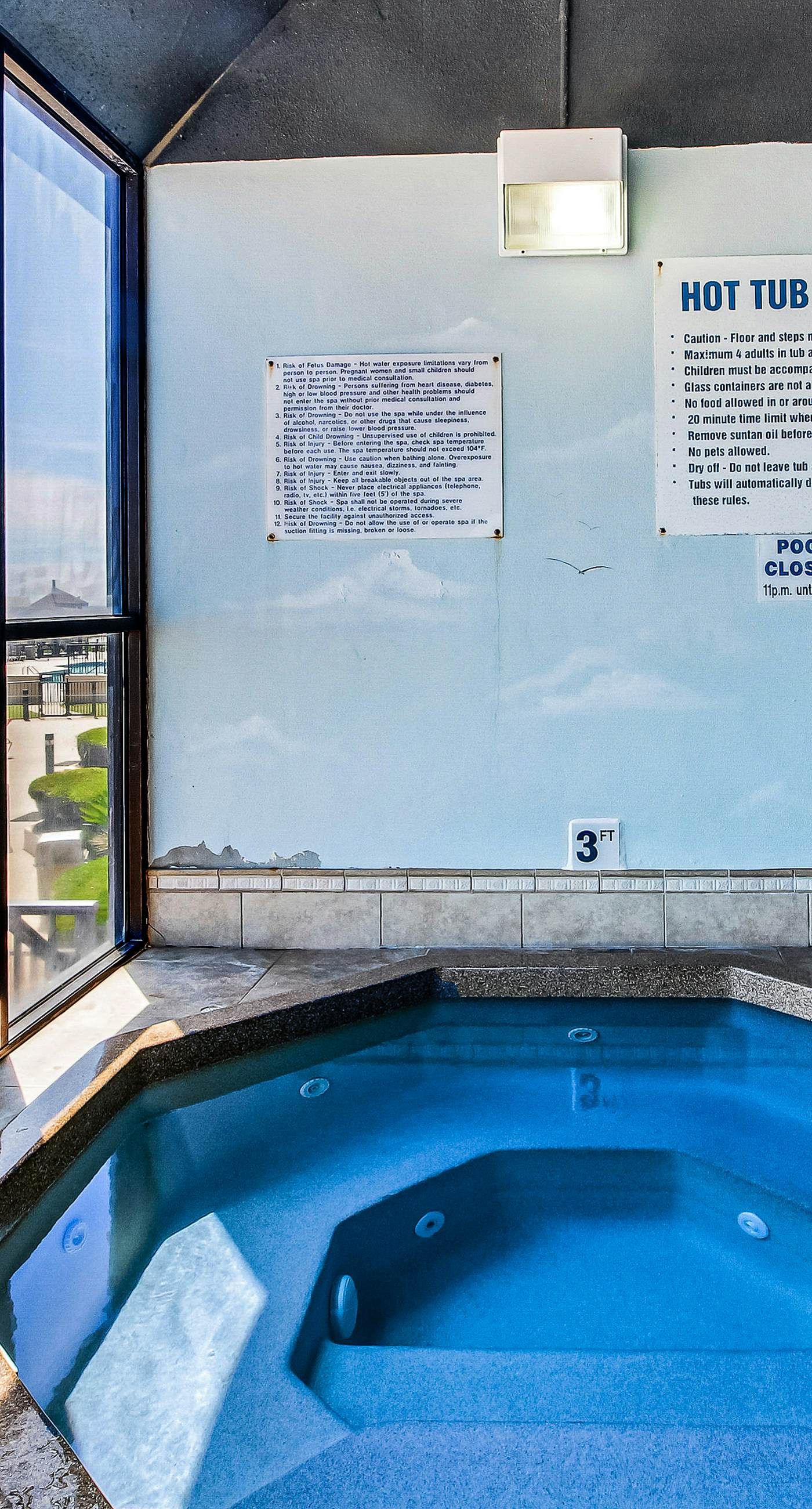 Renovated beachfront condo with balcony, central AC, pool, hot tub & tennis