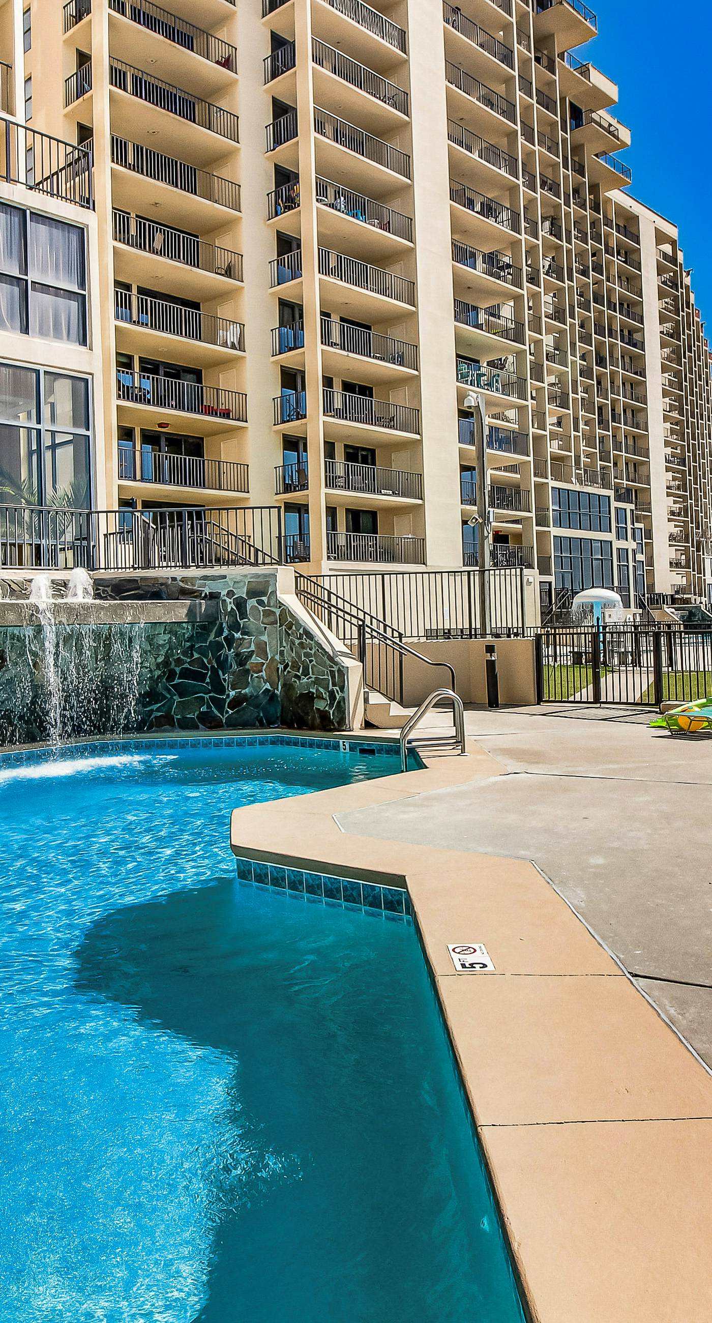 Renovated beachfront condo with balcony, central AC, pool, hot tub & tennis