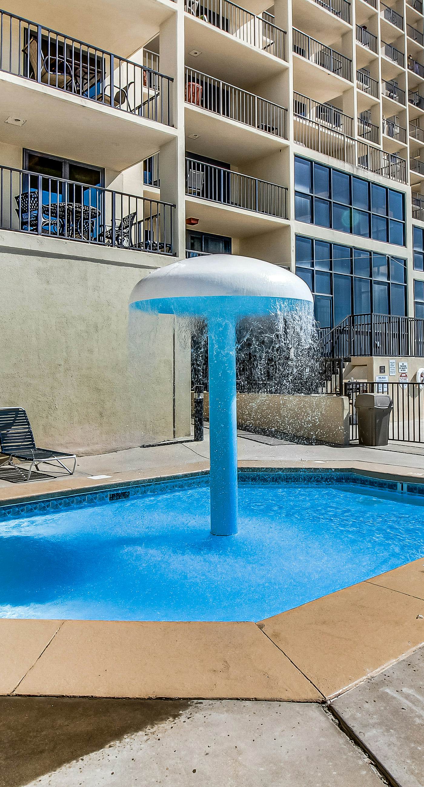 Renovated beachfront condo with balcony, central AC, pool, hot tub & tennis