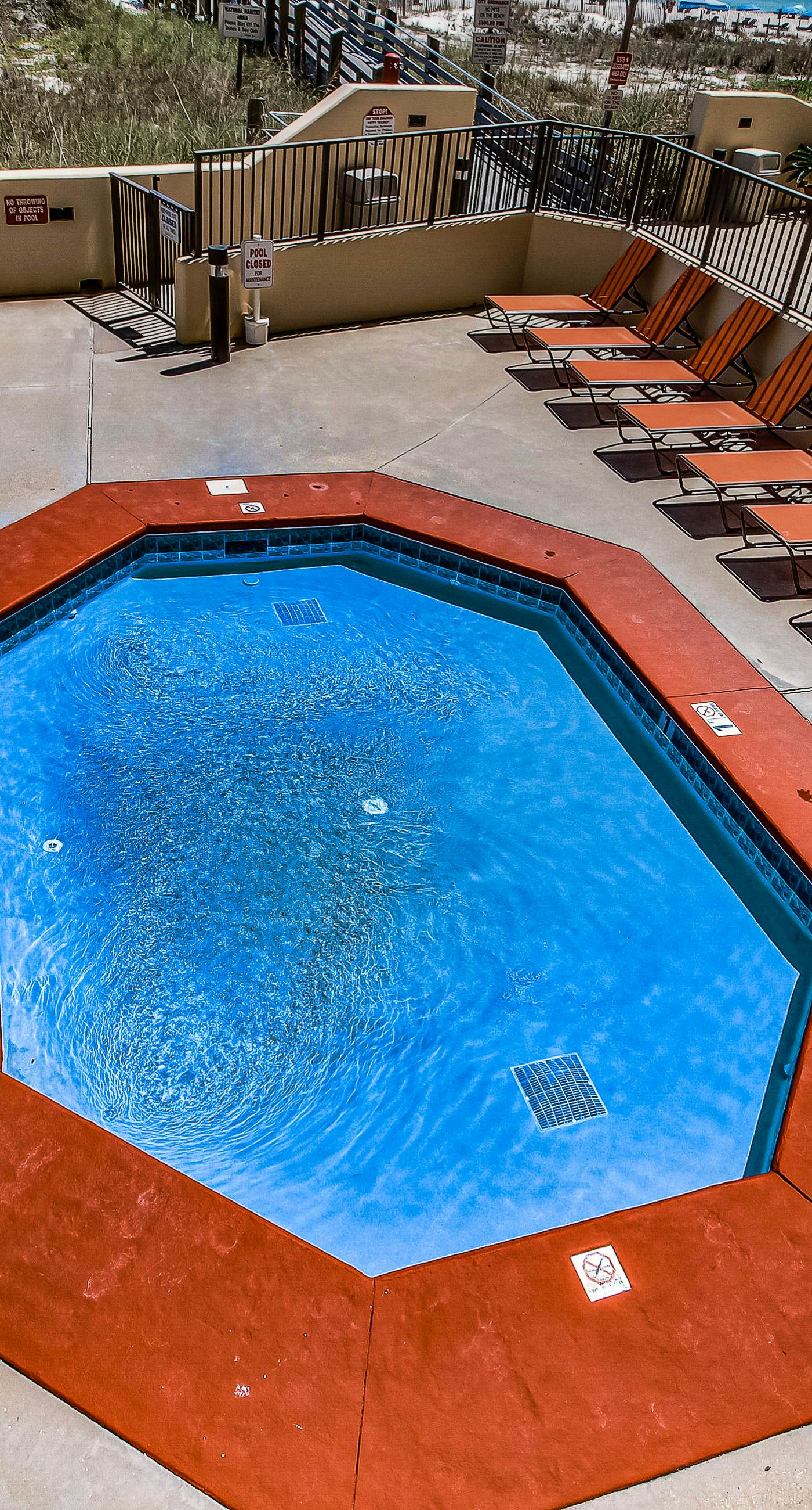 Renovated beachfront condo with balcony, central AC, pool, hot tub & tennis