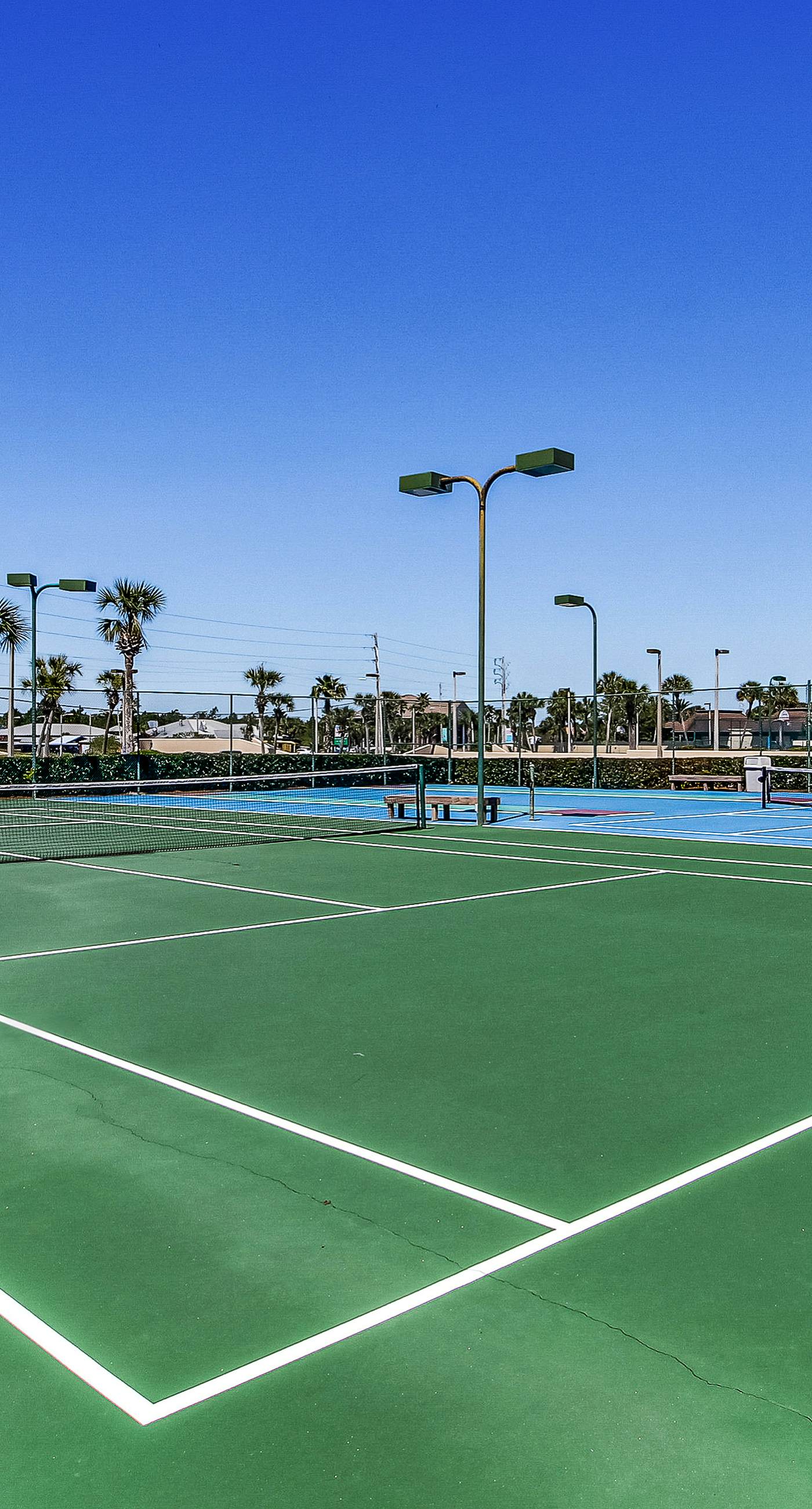 Renovated beachfront condo with balcony, central AC, pool, hot tub & tennis