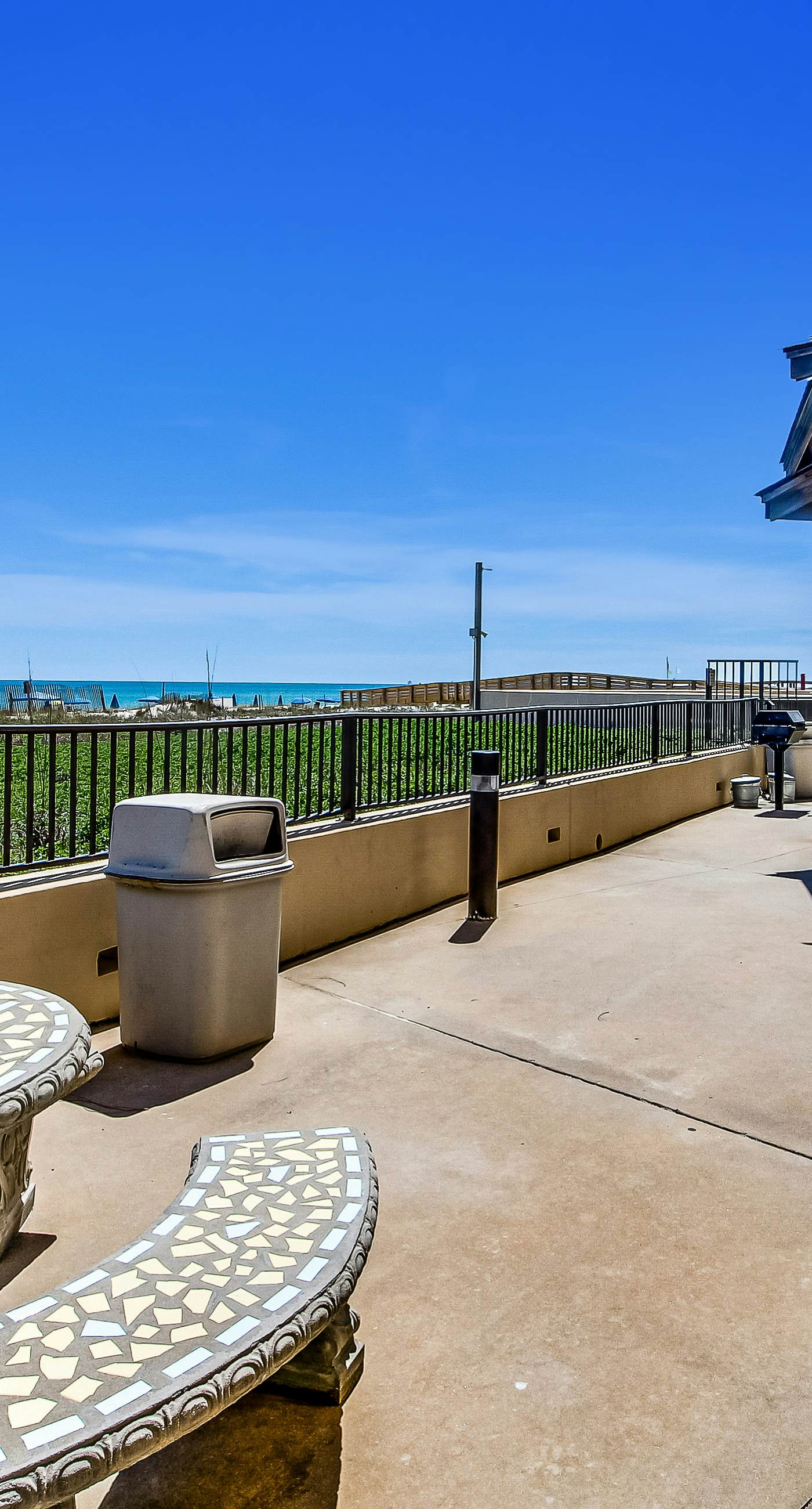 Renovated beachfront condo with balcony, central AC, pool, hot tub & tennis