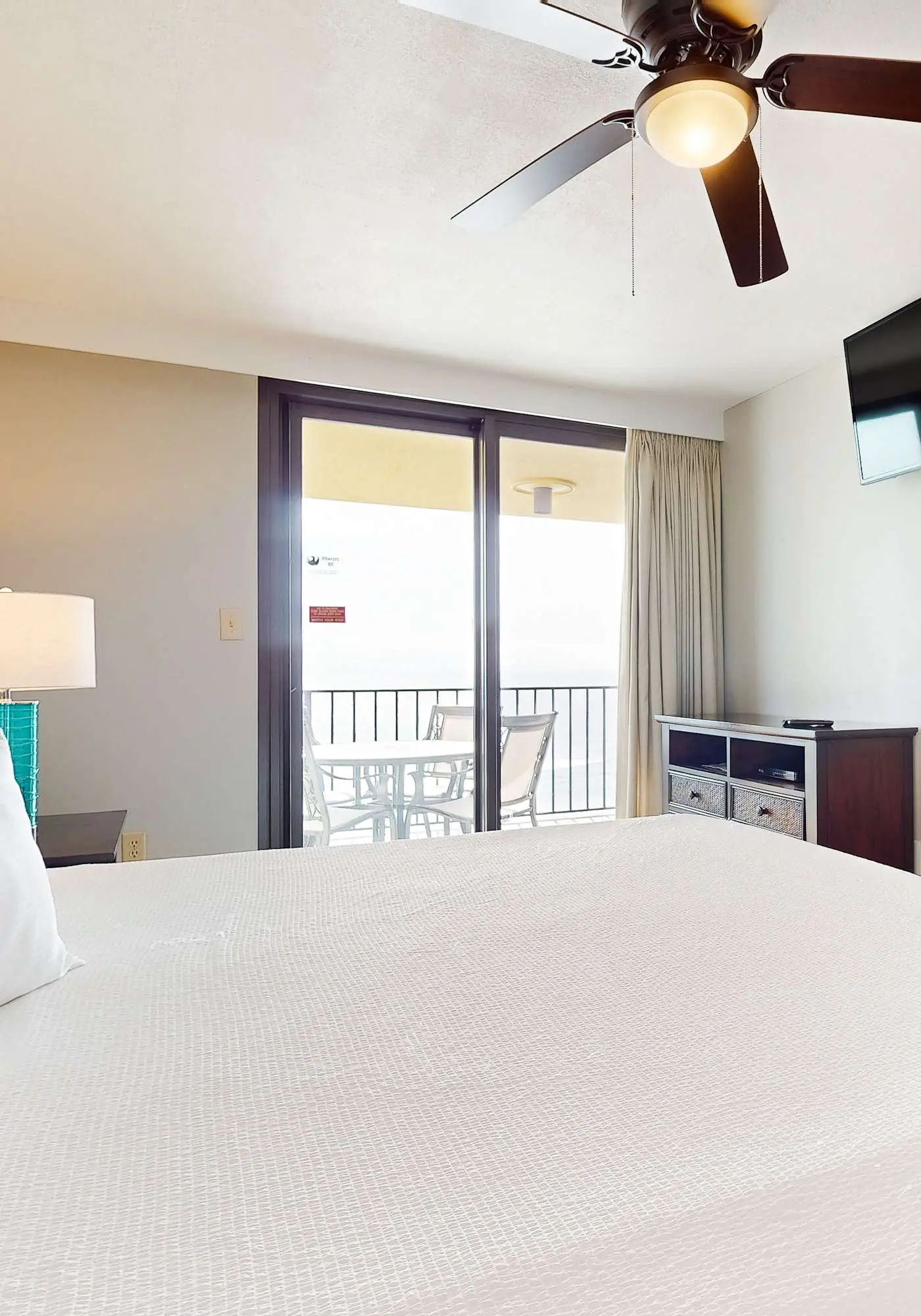 Renovated beachfront condo with balcony, central AC, pool, hot tub & tennis
