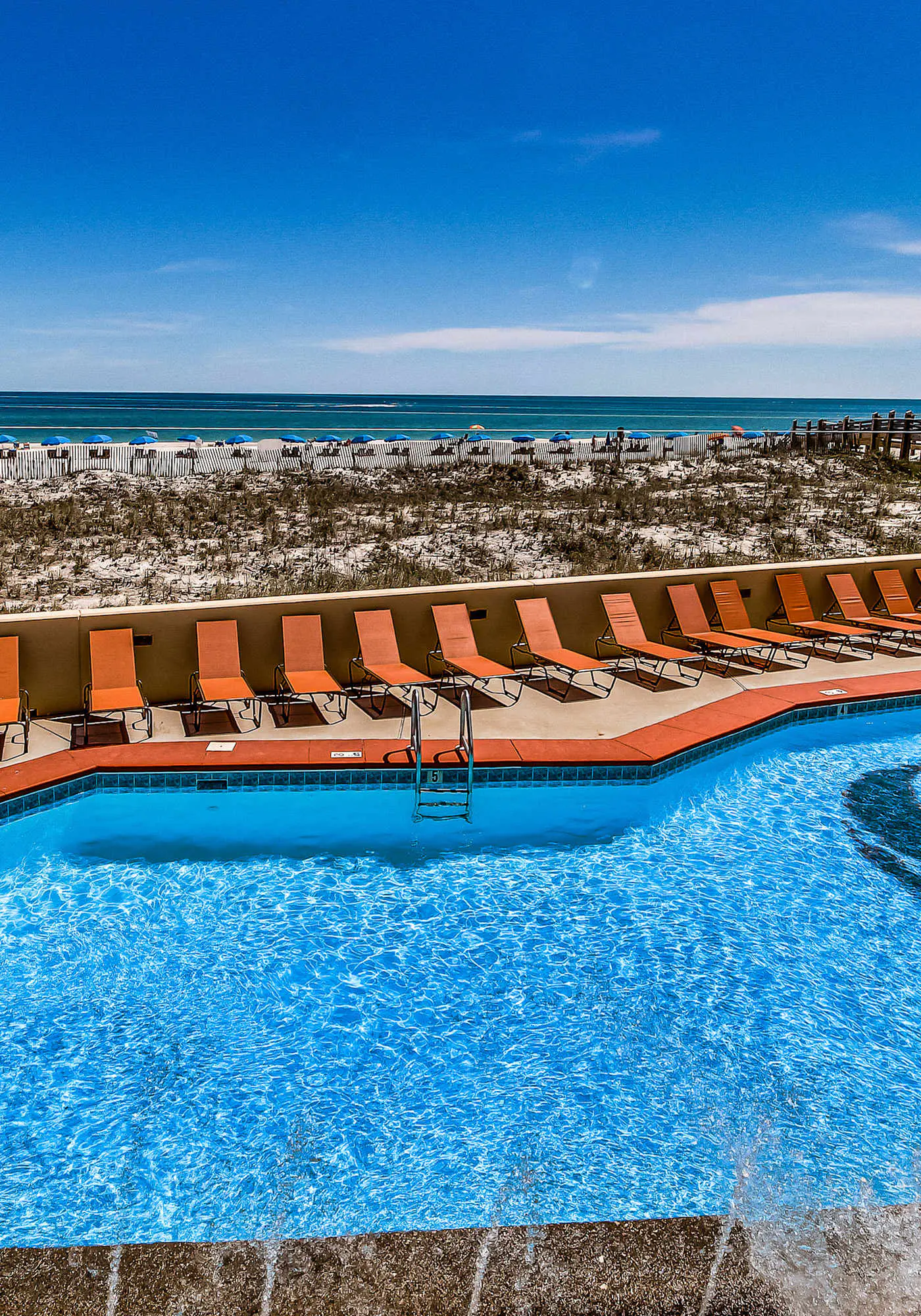 Renovated beachfront condo with balcony, central AC, pool, hot tub & tennis