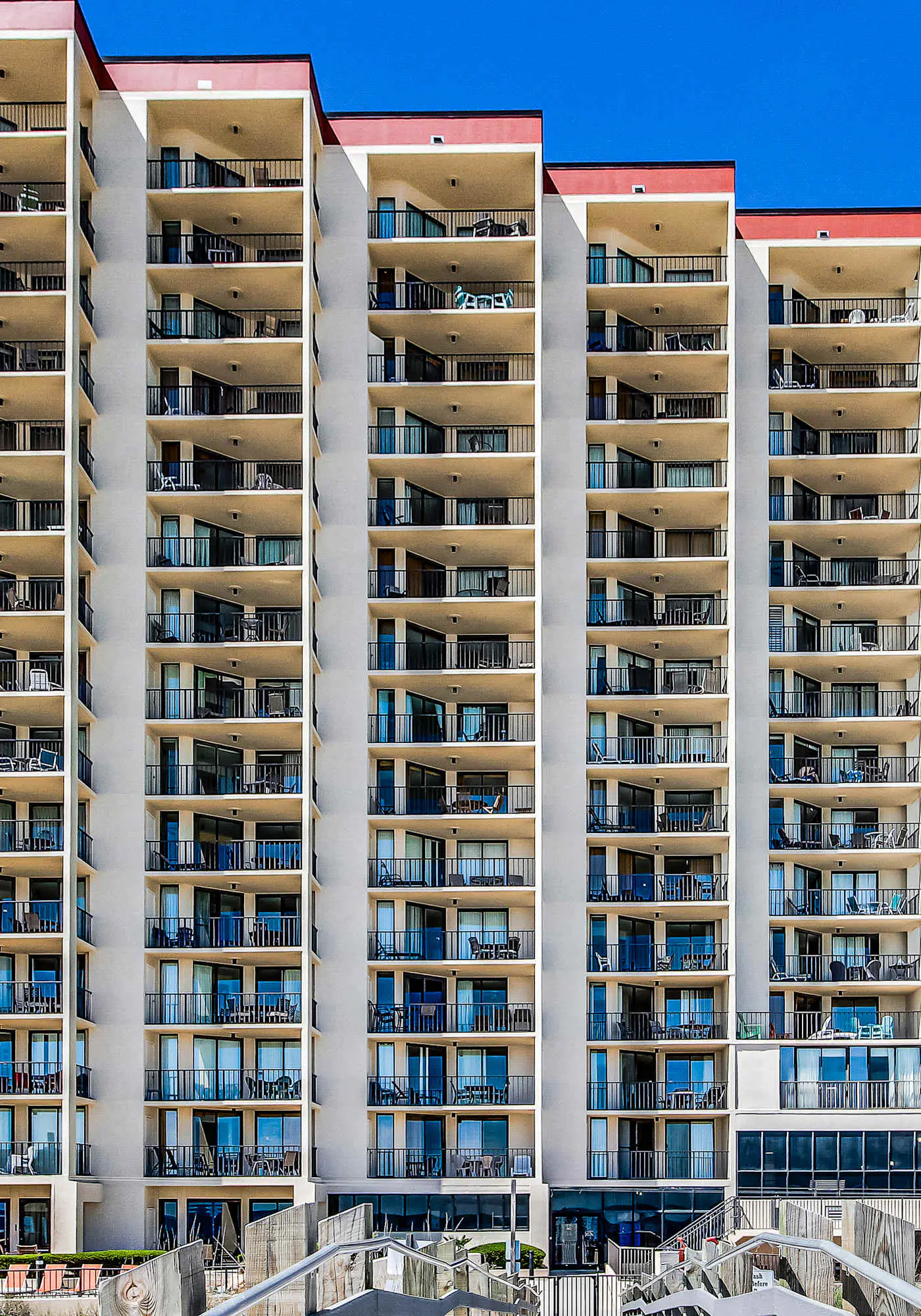 Renovated beachfront condo with balcony, central AC, pool, hot tub & tennis