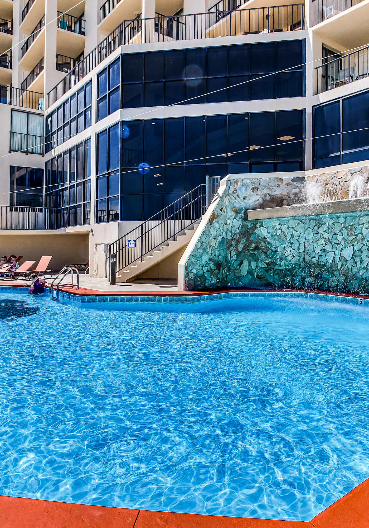 Renovated beachfront condo with balcony, central AC, pool, hot tub & tennis