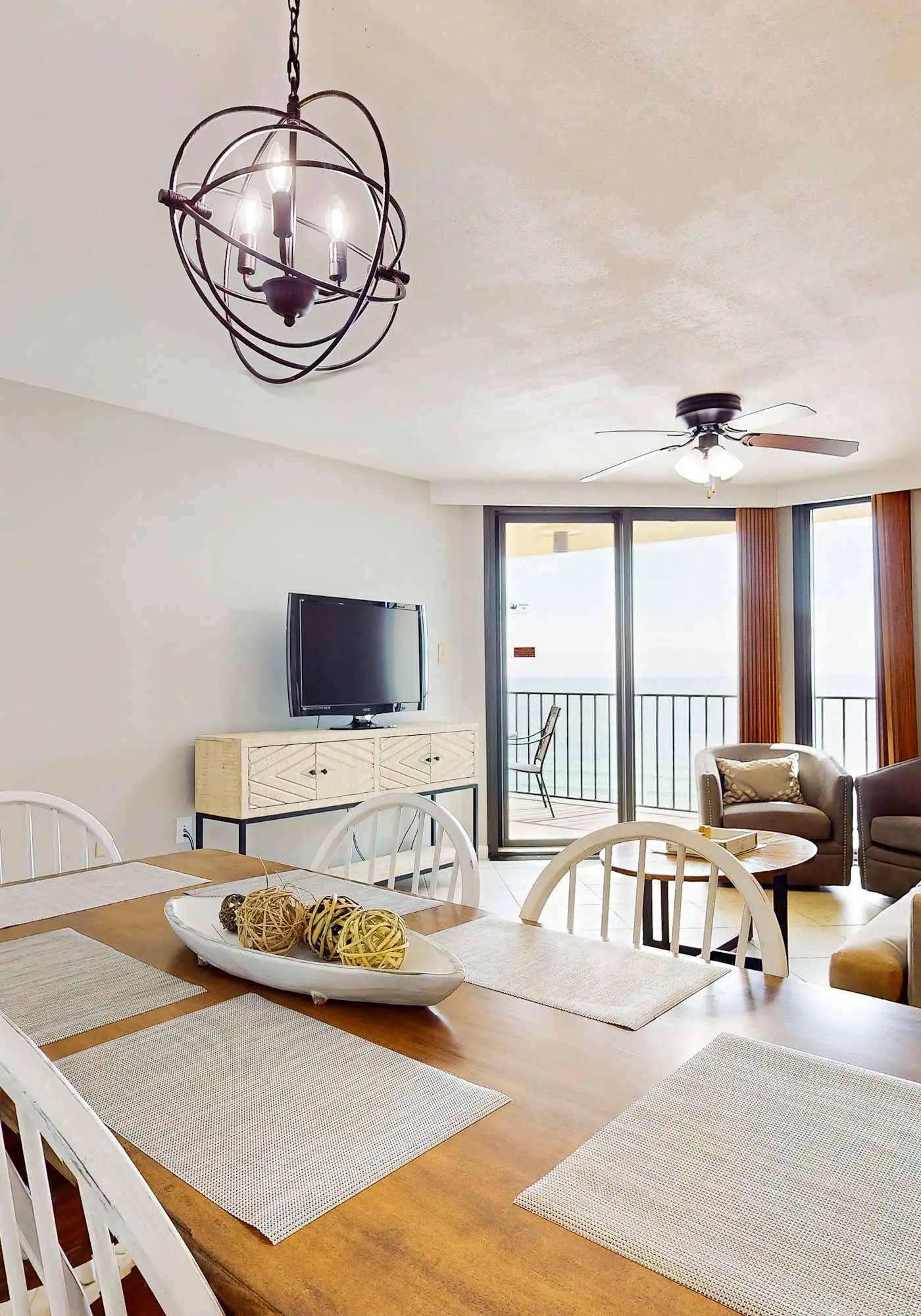 Renovated beachfront condo with balcony, central AC, pool, hot tub & tennis