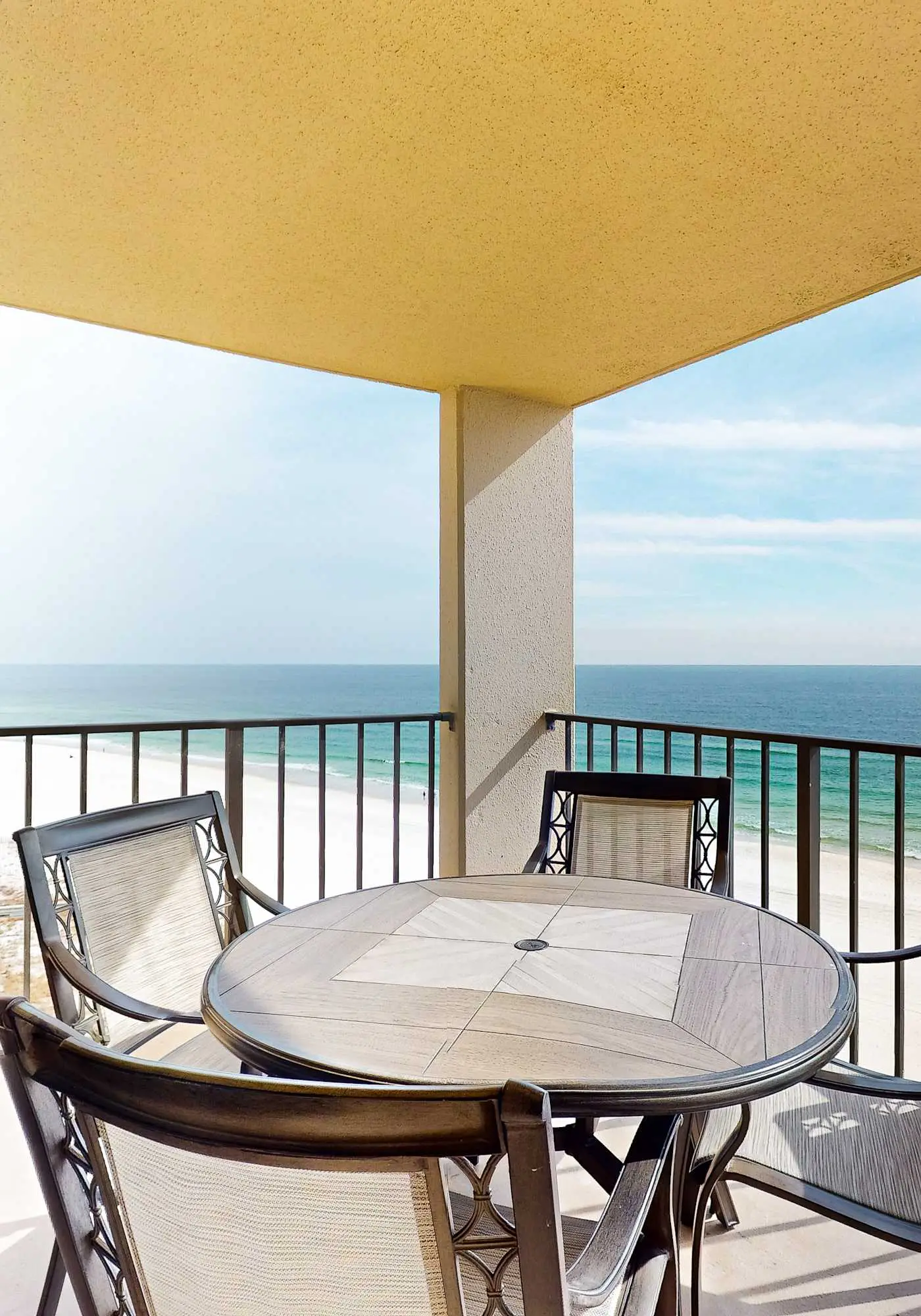 Renovated beachfront condo with balcony, central AC, pool, hot tub & tennis