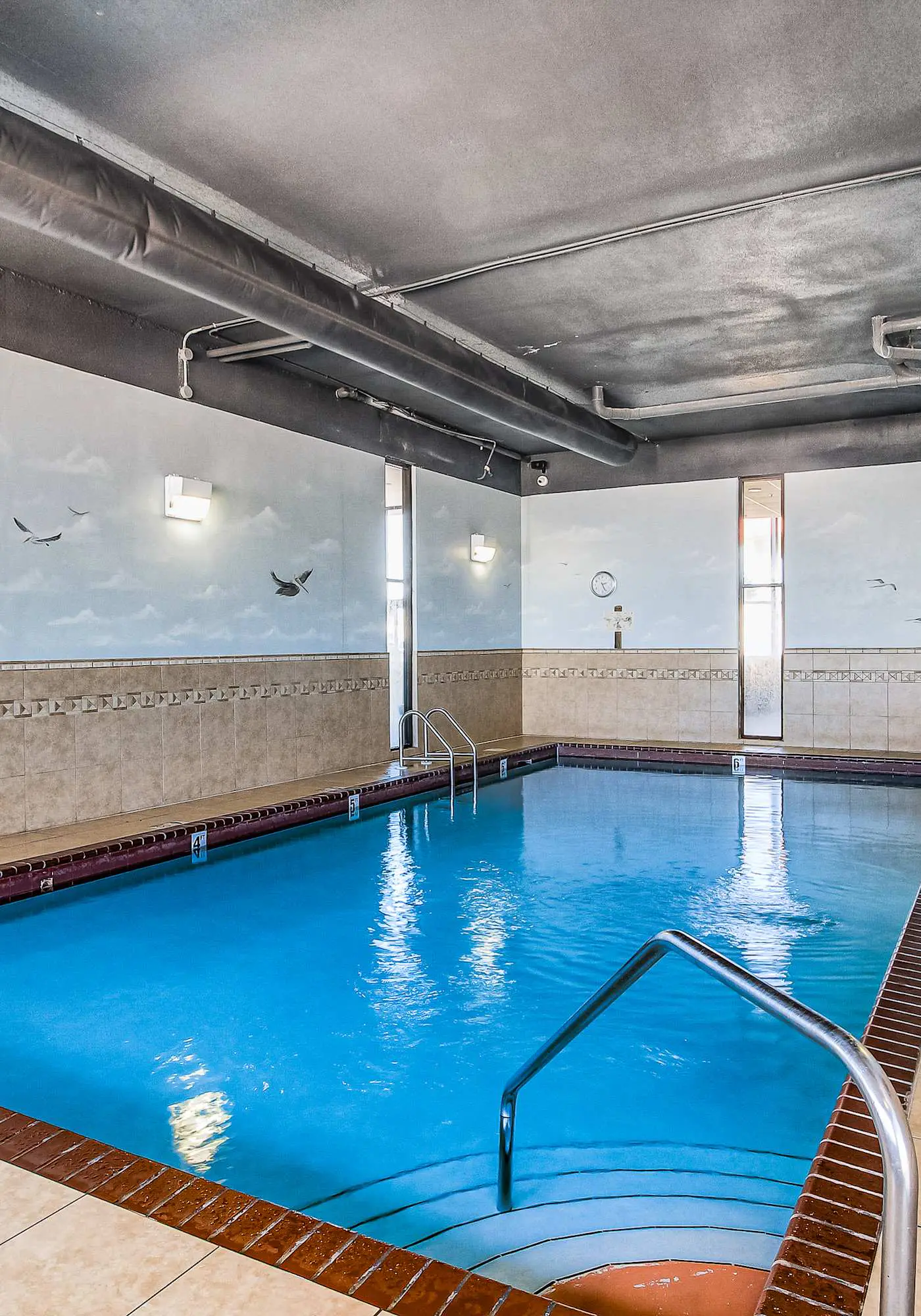 Renovated beachfront condo with balcony, central AC, pool, hot tub & tennis