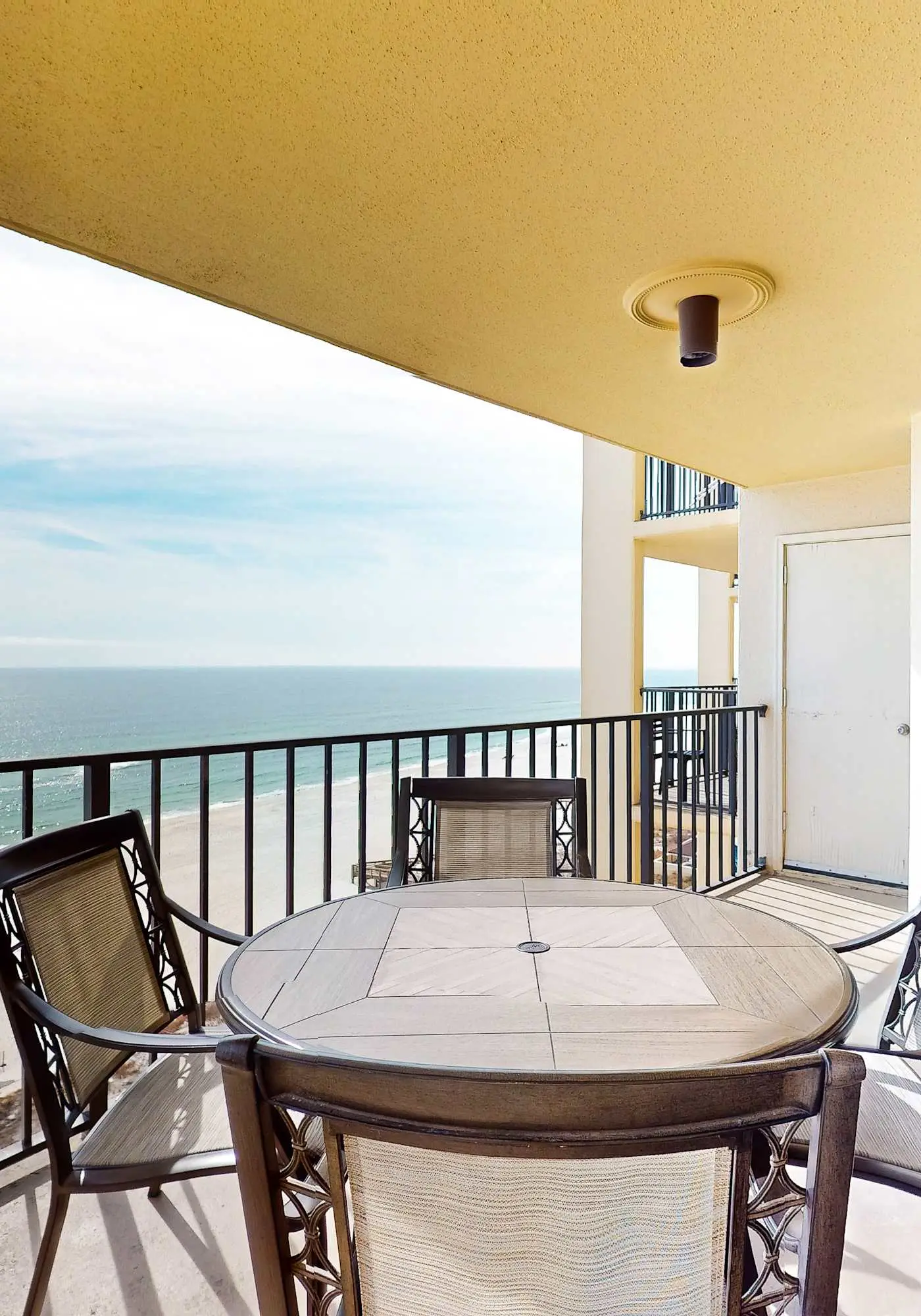 Renovated beachfront condo with balcony, central AC, pool, hot tub & tennis
