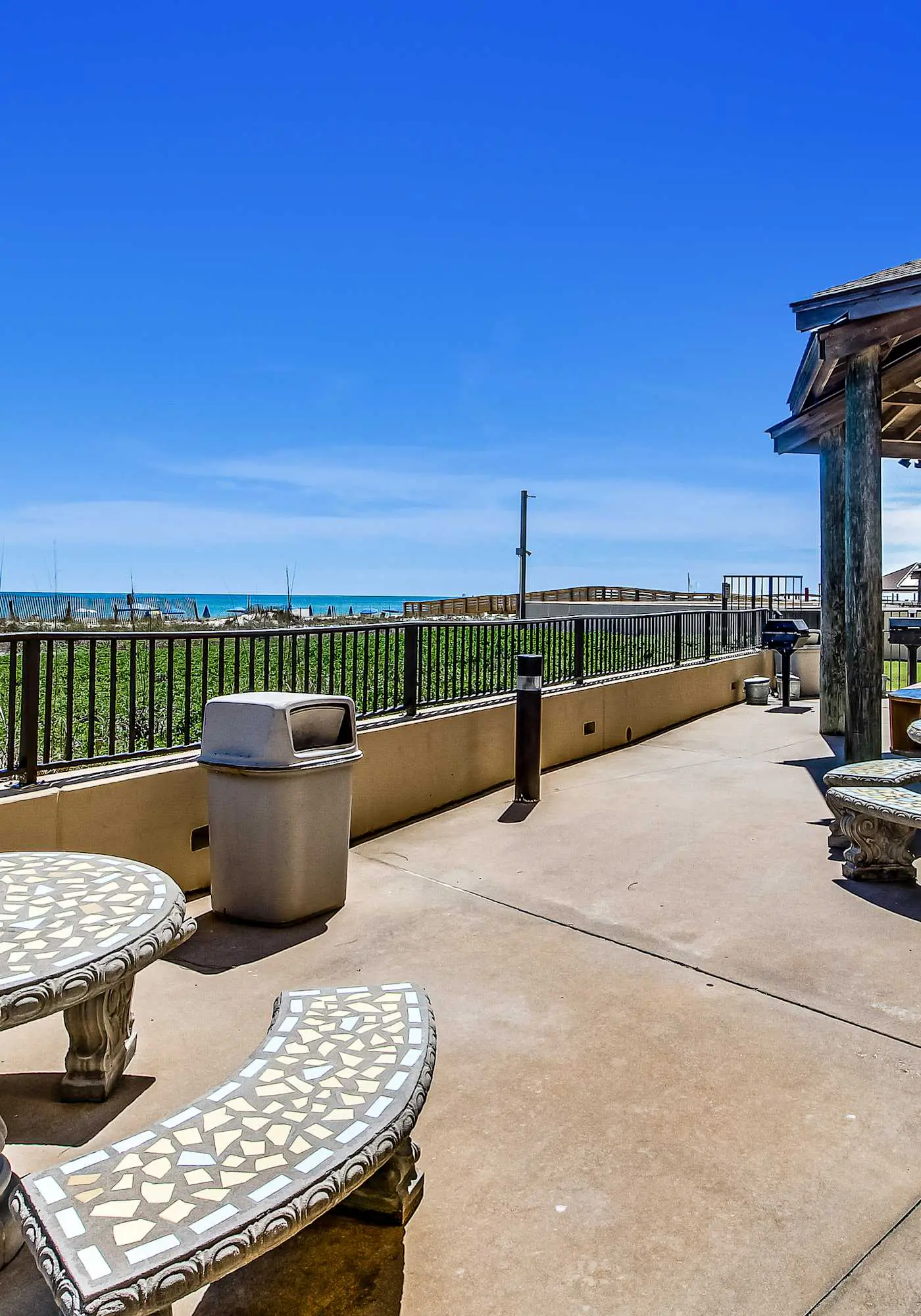 Renovated beachfront condo with balcony, central AC, pool, hot tub & tennis